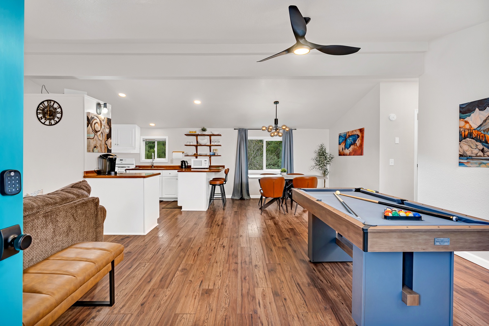 Your perfect blend of relaxation and entertainment awaits—shoot pool, cook meals, and unwind in this stylish open-plan space with modern touches.