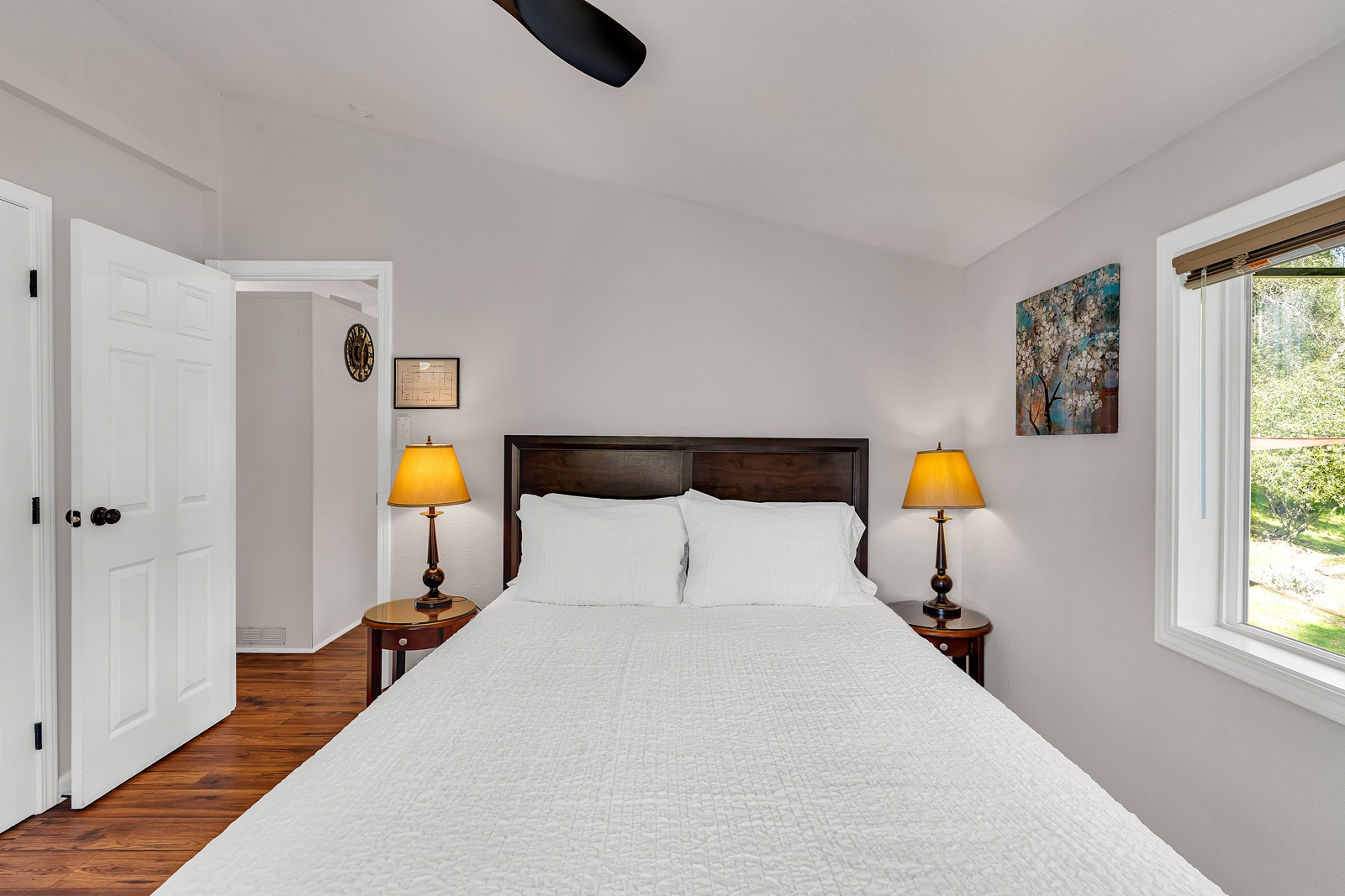 Sink into crisp white linens in your peaceful bedroom, and comfy bedding to create the perfect retreat for restful nights.