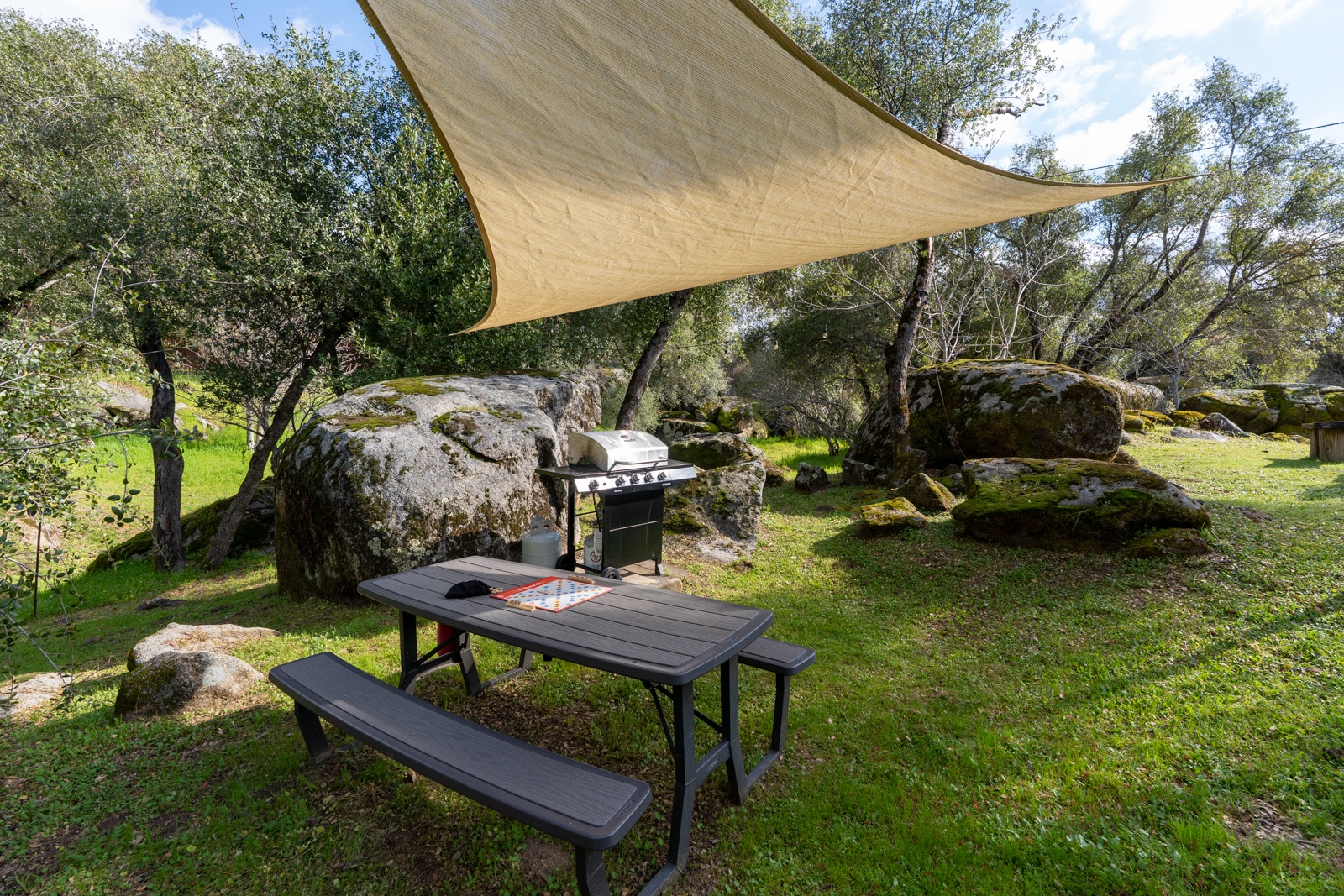 Your perfect outdoor dining spot awaits, with BBQ ready for grilling.