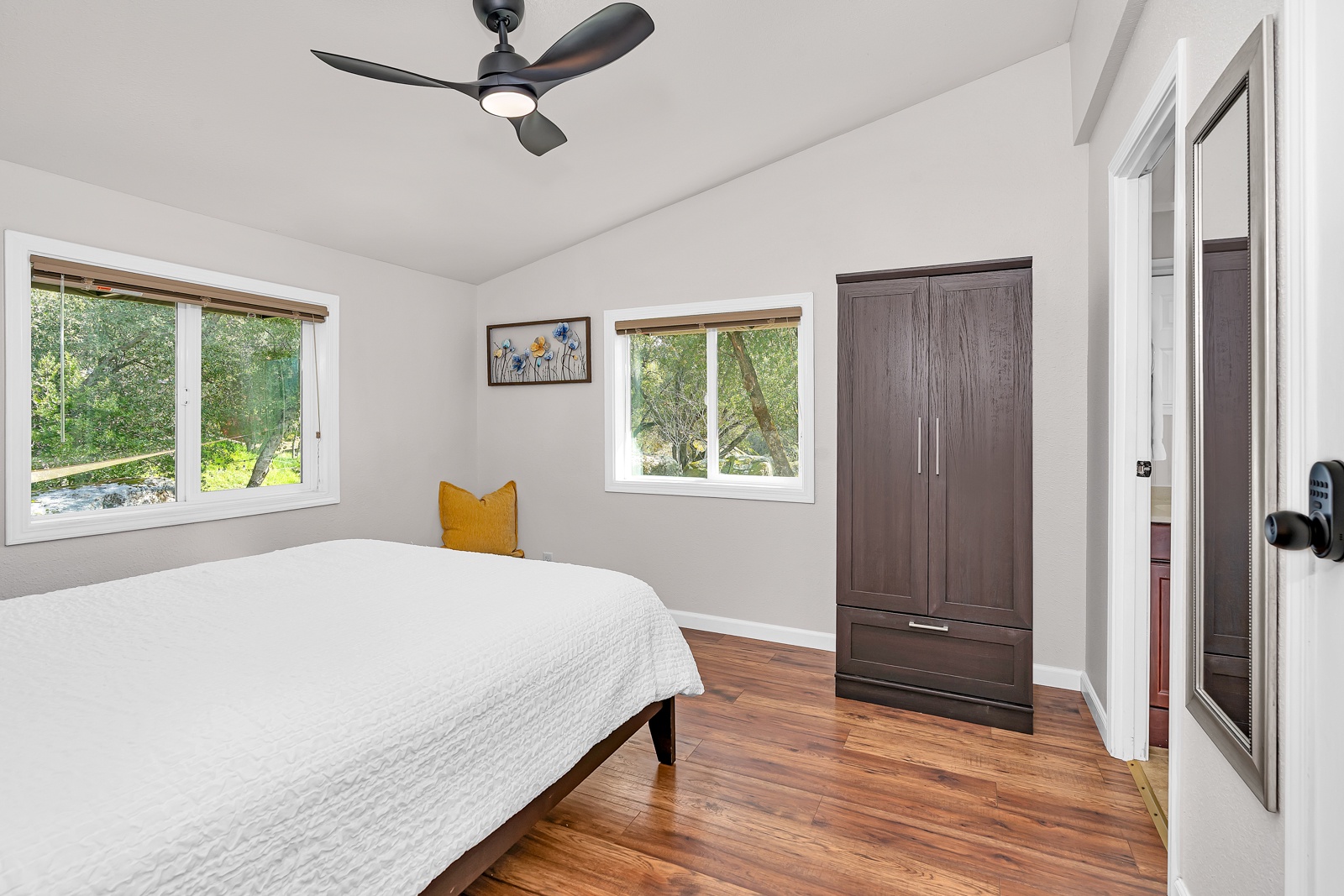 Primary bedroom has brand new luxury queen mattress for a wonderful night sleep.