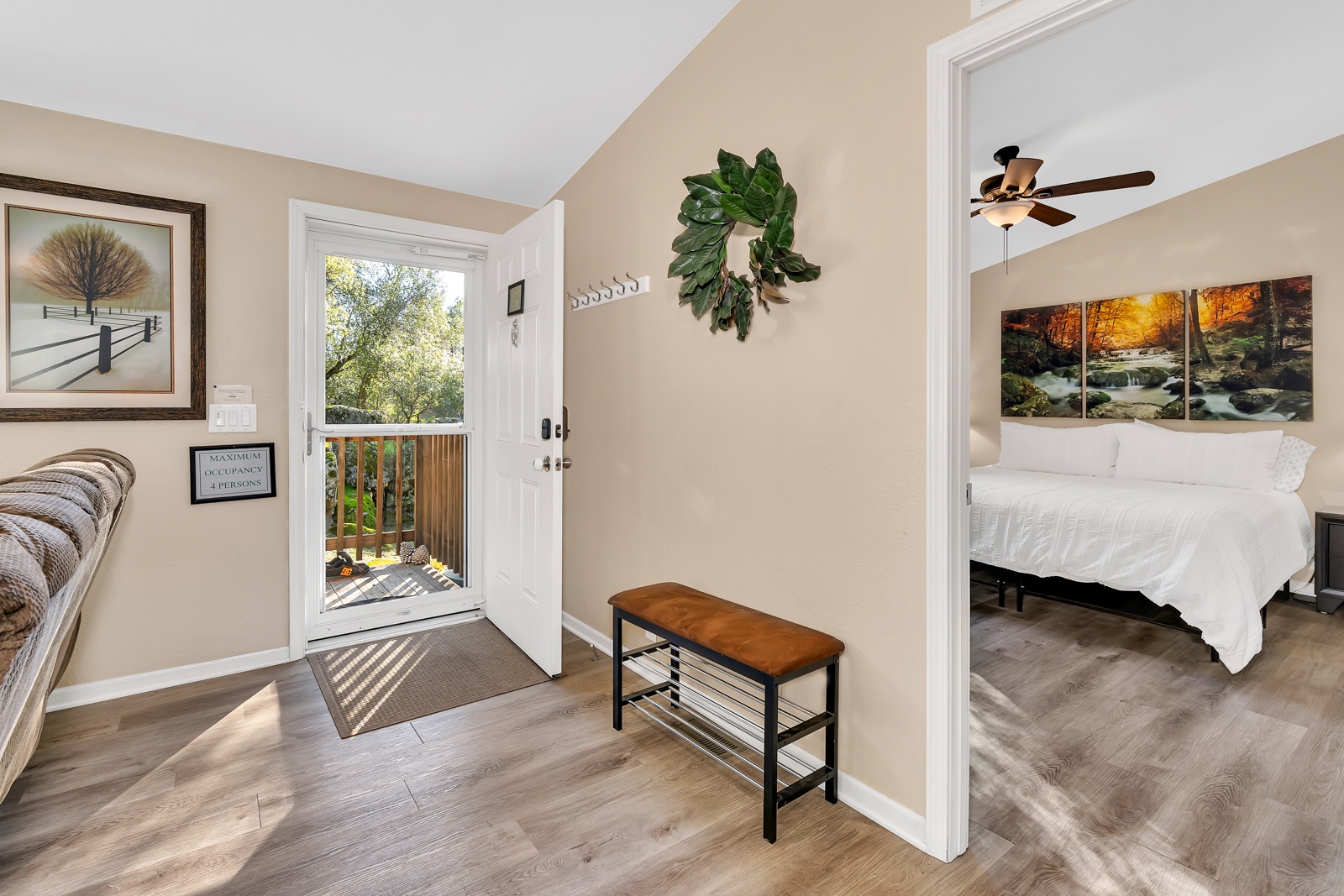 Your welcoming entryway flows seamlessly into a cozy open living room.