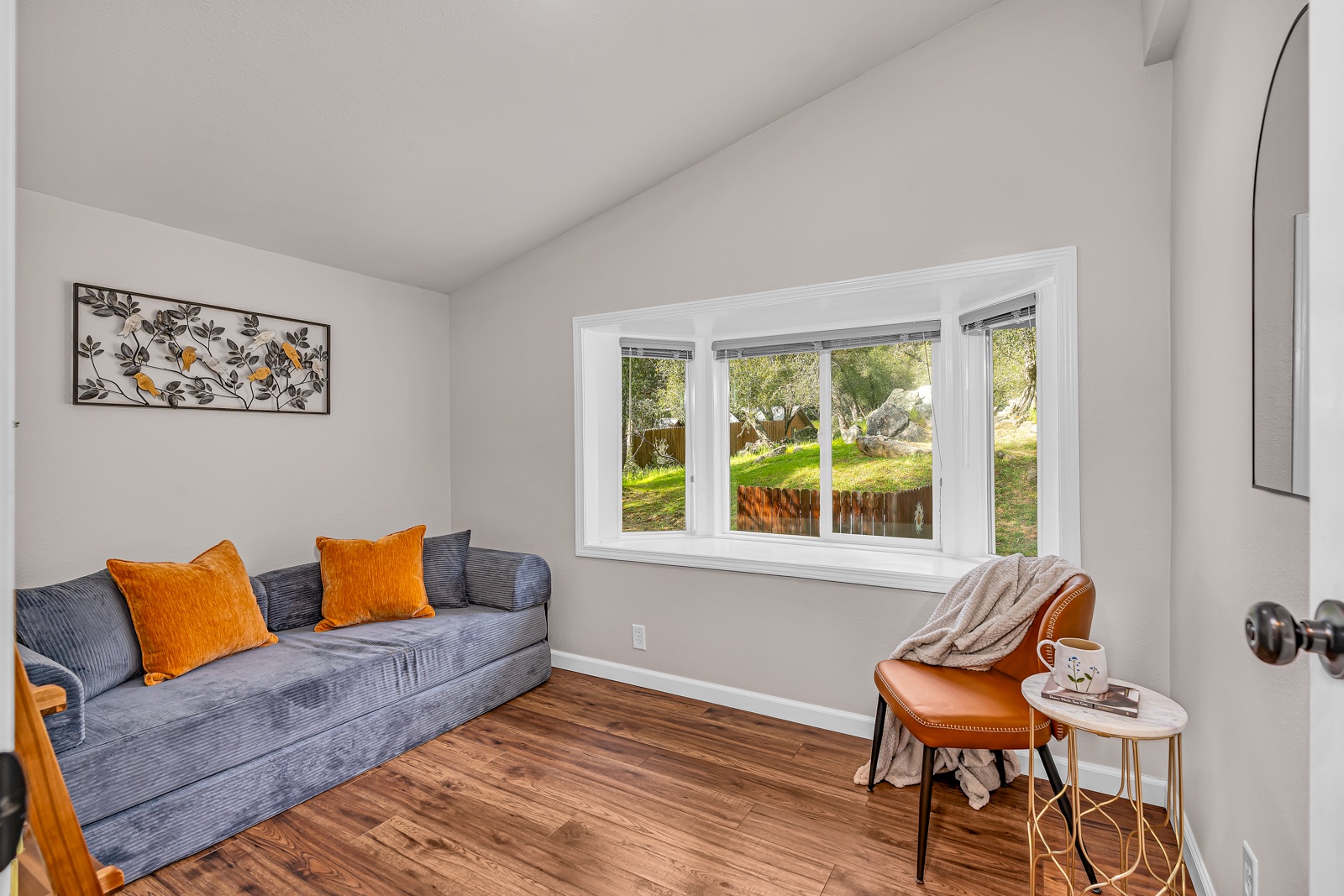 Curl up on the futon while enjoying peaceful views through your bay window.