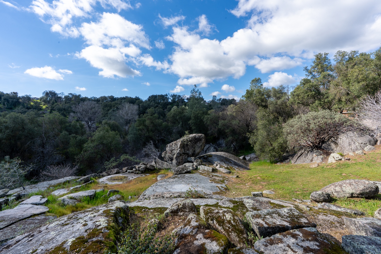 Rocky terrain surround the property area.
