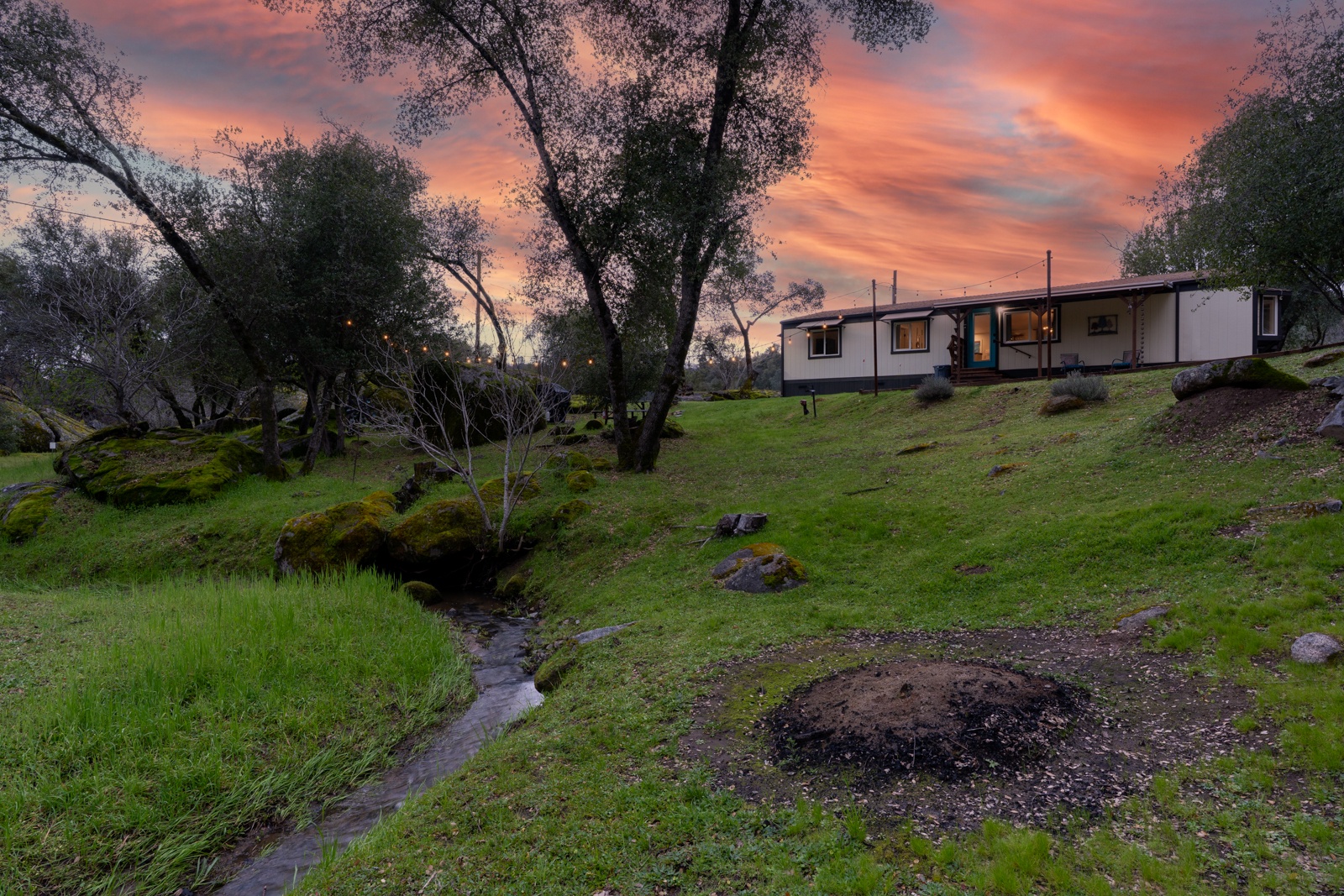 Seasonal creek winds through the property.