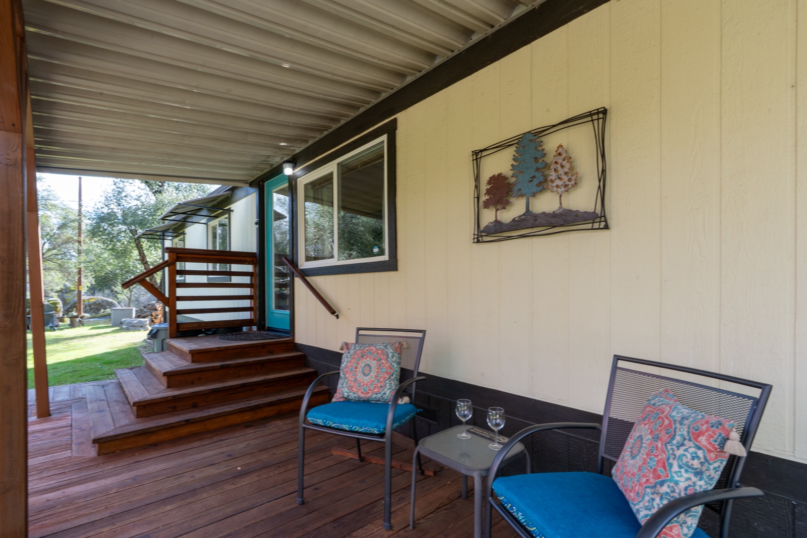 Step onto your private covered front porch, with comfortable seating for morning coffee or evening relaxation.