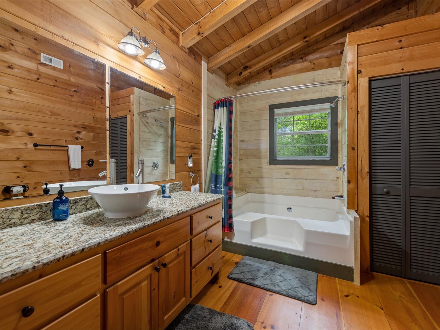 Lazy Bear Cove- Master Bathroom with soaker tub and vanity sink