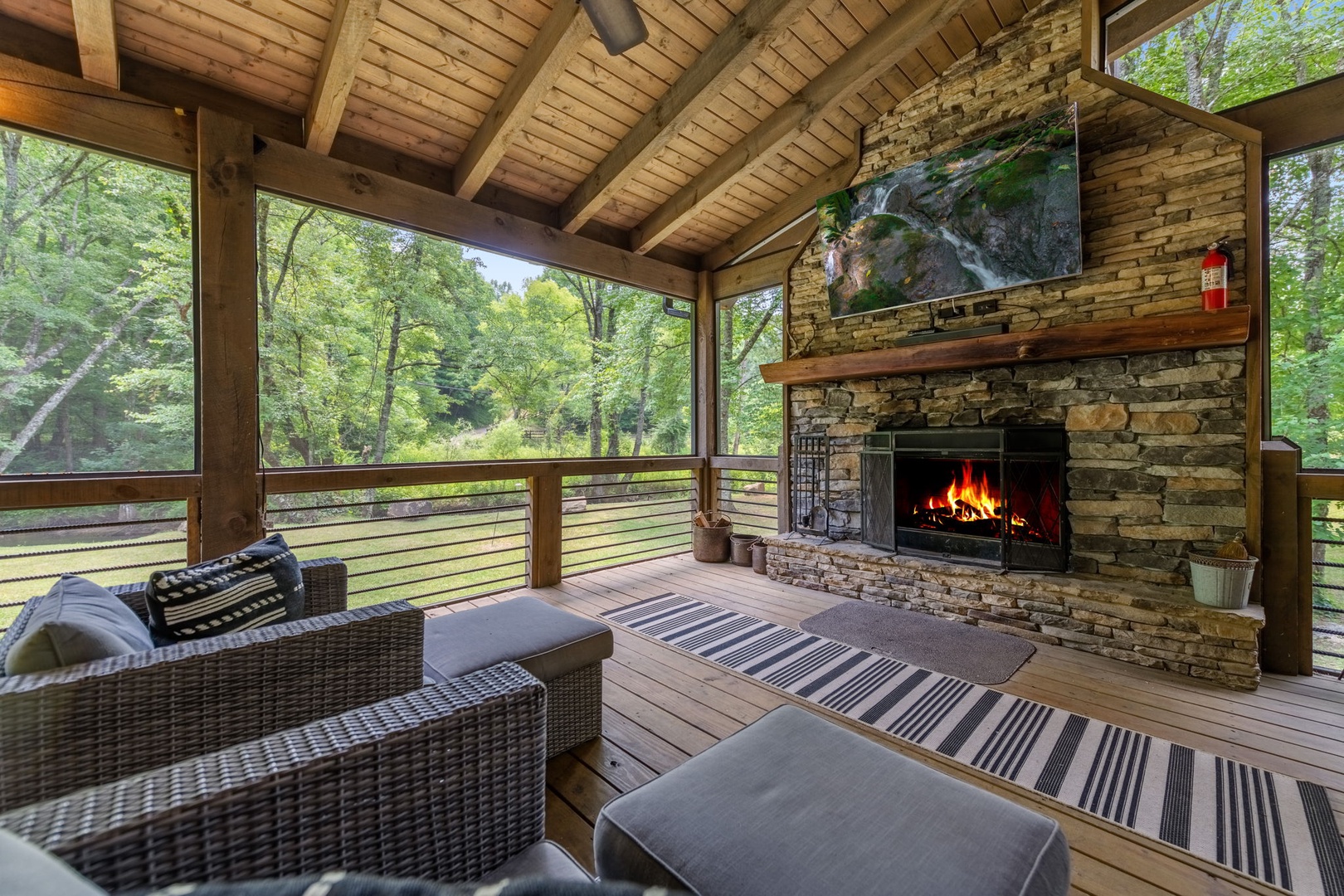 Indian Creek Lodge - Deck Seating and Fireplace
