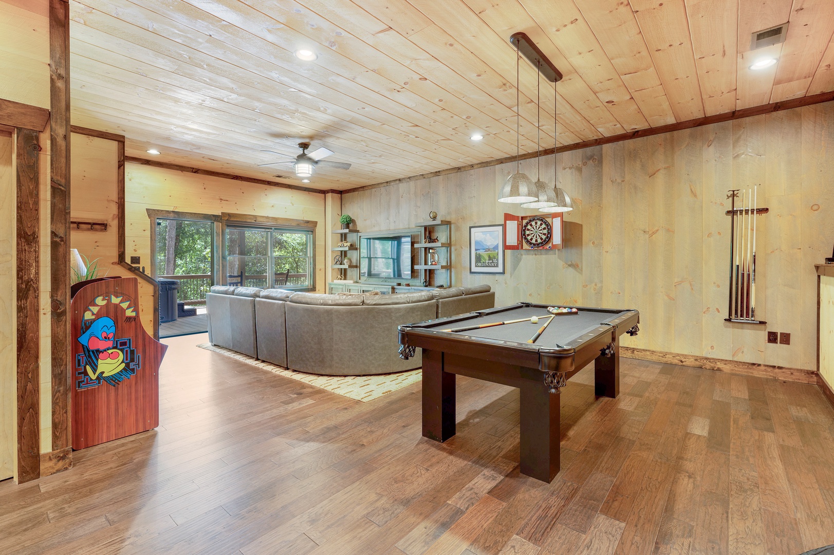 Mountain Echoes- Lower level seating and gaming area with a pool table
