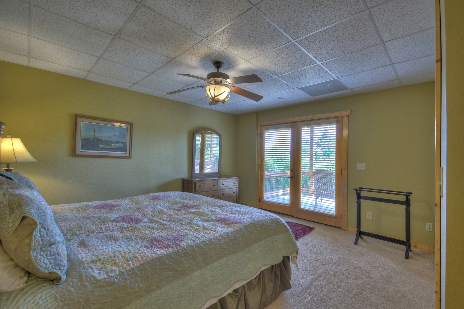 Above Ravens Ridge- Lower level queen bedroom with balcony access