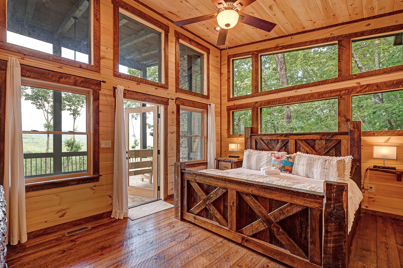 Feather & Fawn Lodge- Master bedroom with deck access