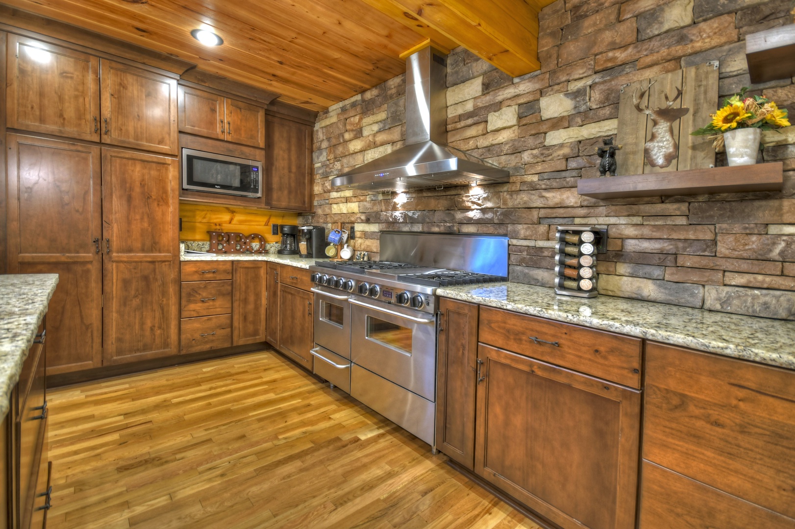 Hogback Haven- Kitchen area with stove appliances