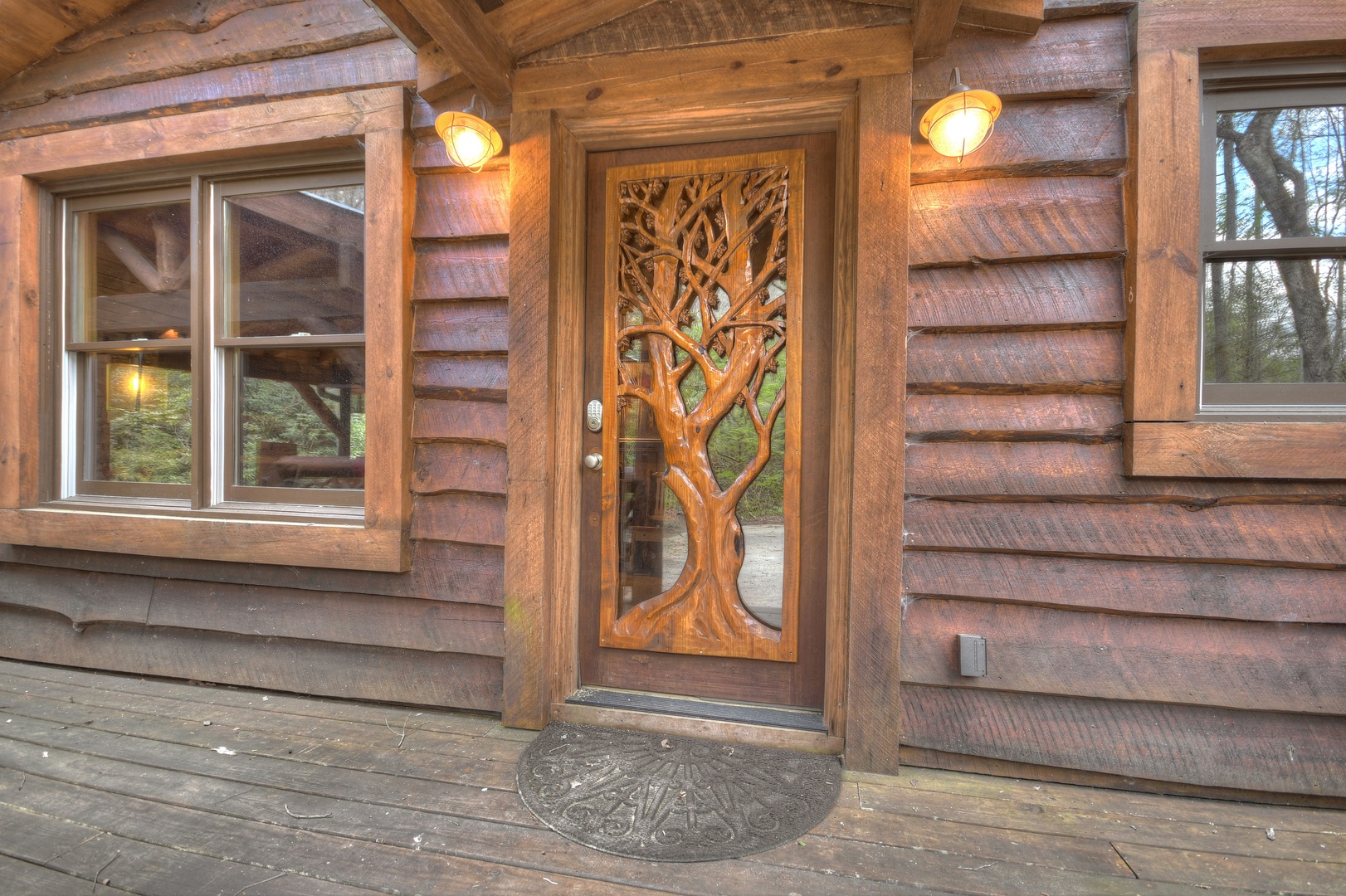 Hothouse Hideaway- Entryway door with beautiful wood design