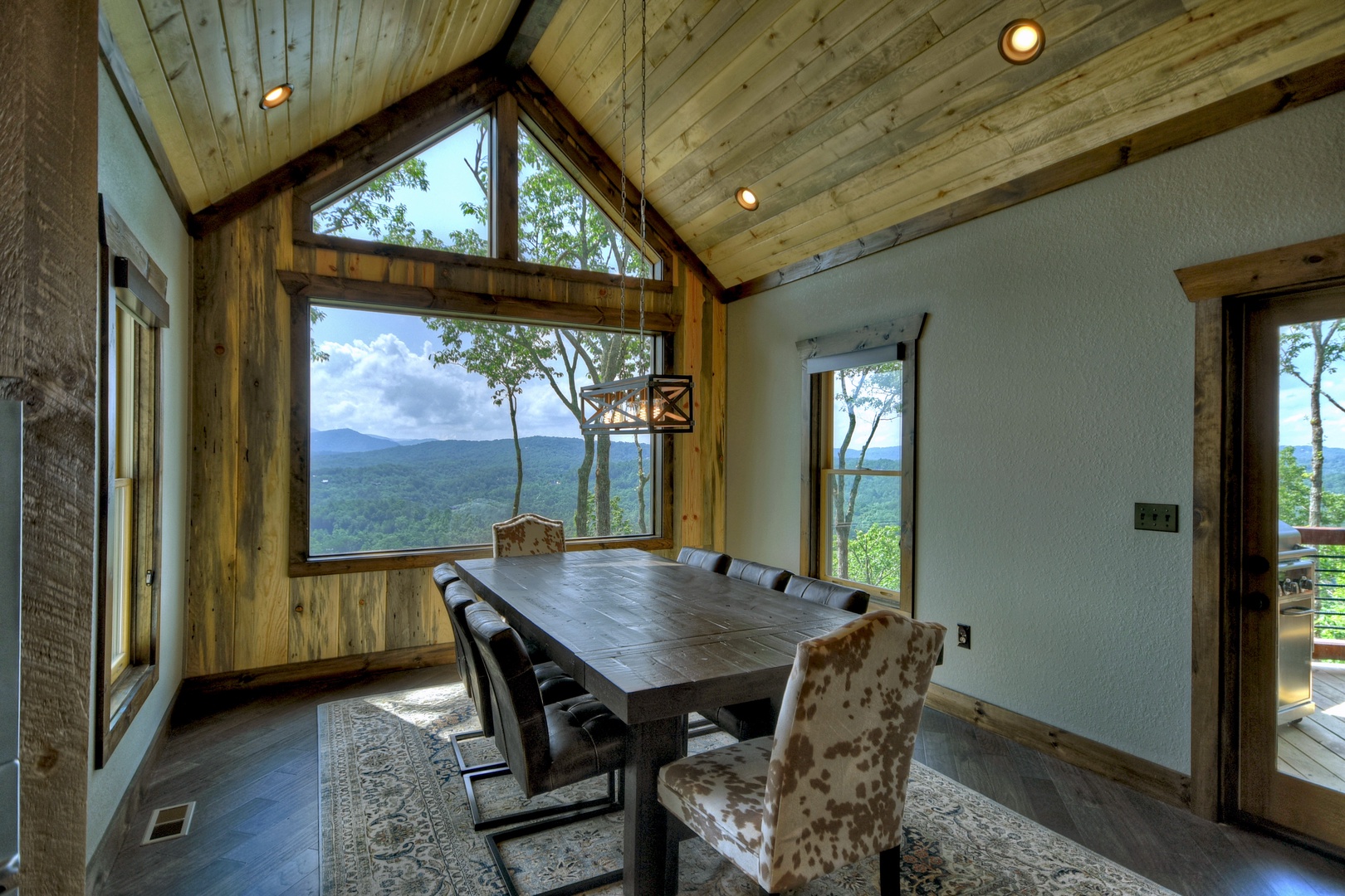 New Heights- Dining area with long range mountain views
