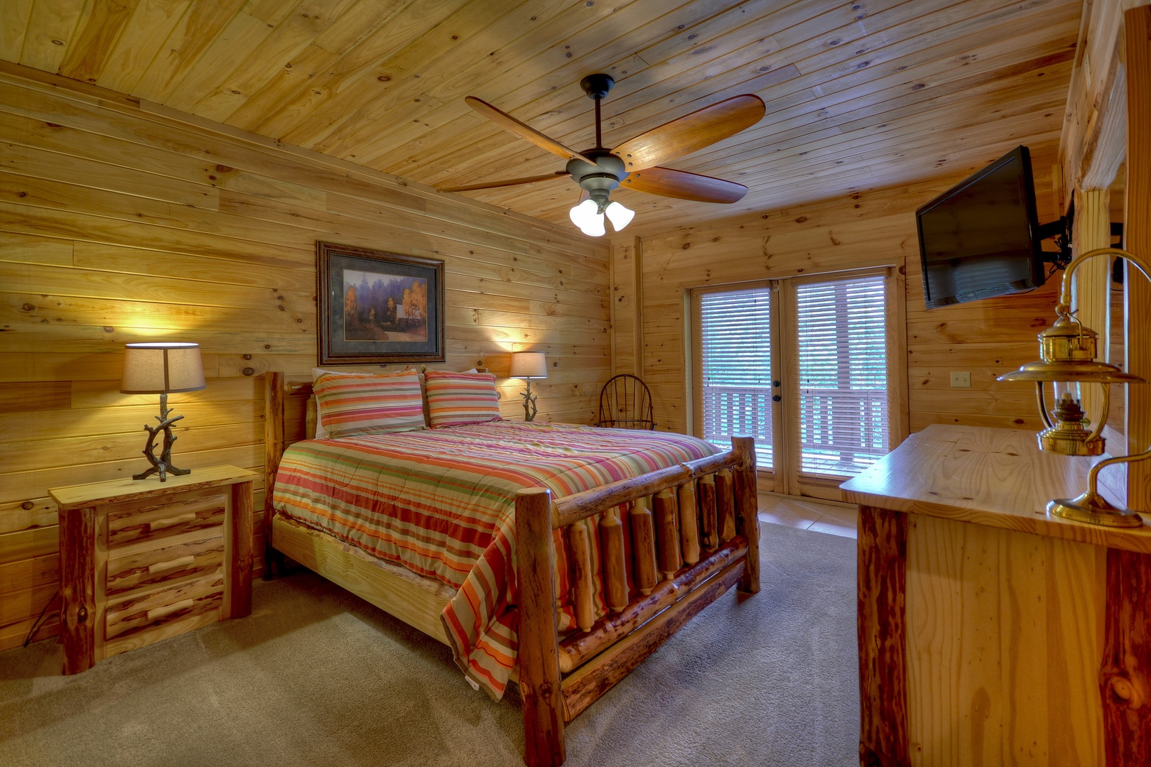 Luxury At The Settlement- Bedroom with deck access