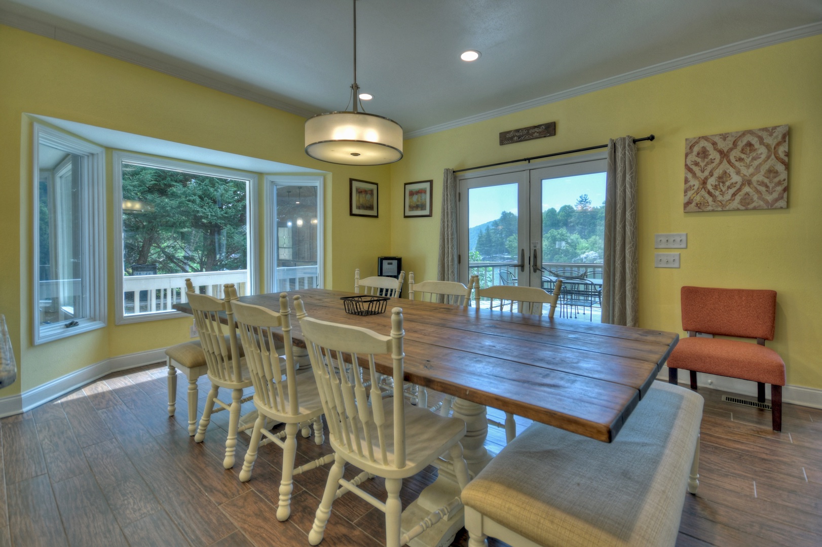 Jump Right In- Dining room area with table and chairs and deck access