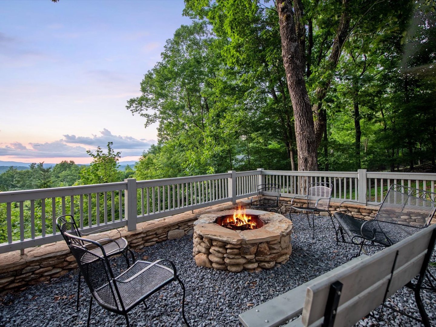 Aska Bliss- Stone firepit with the mountain view and outdoor seating