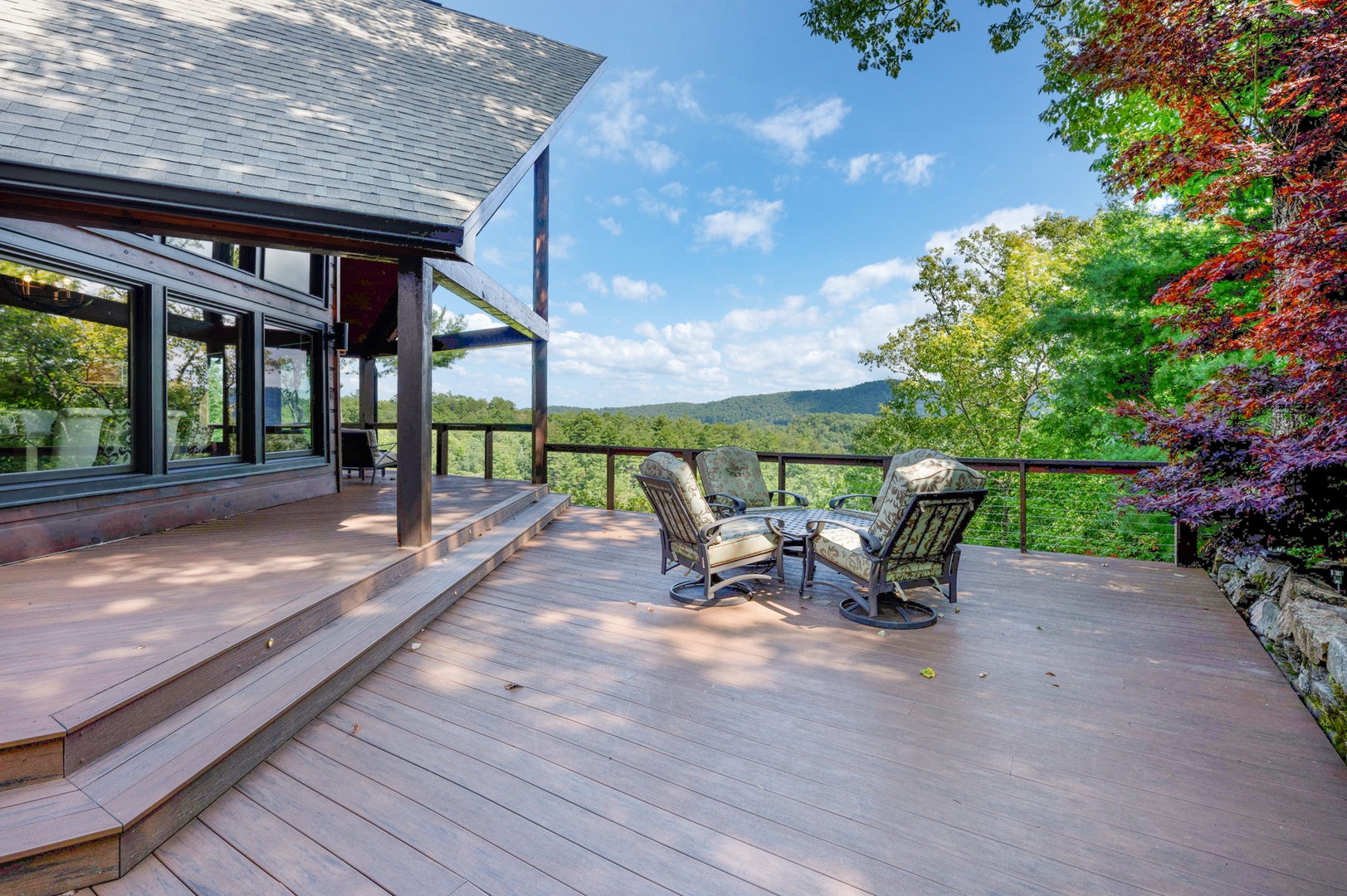 Kricket's Overlook- Entry level open area deck seating with mountain views