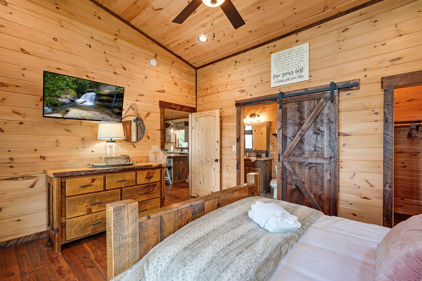 Feather & Fawn Lodge- Entry level guest bedroom with a private bathroom