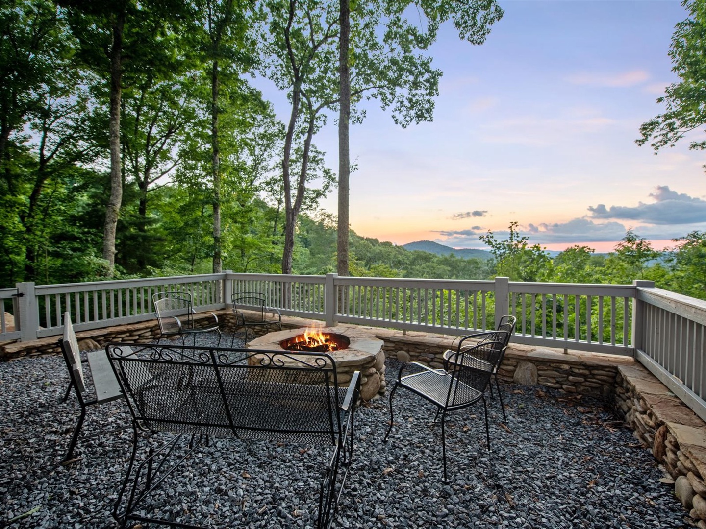 Aska Bliss- Stone firepit with the mountain view and outdoor seating