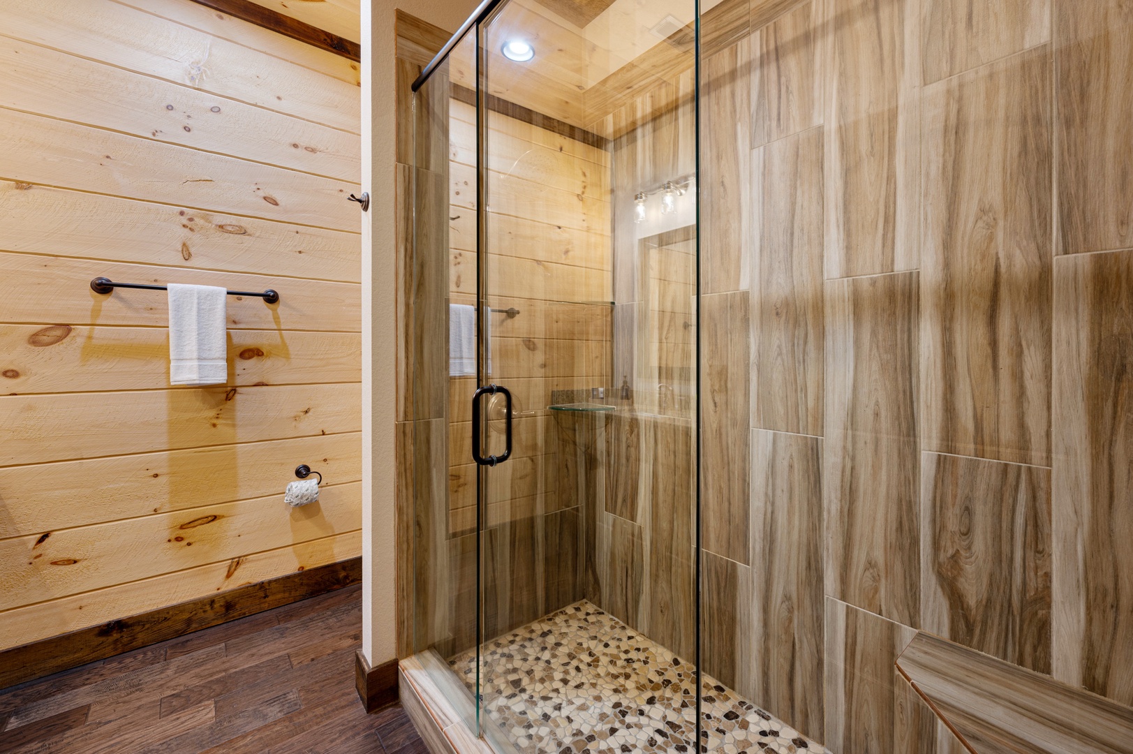 Mountain Echoes- Lower level shared bath with a walk in shower