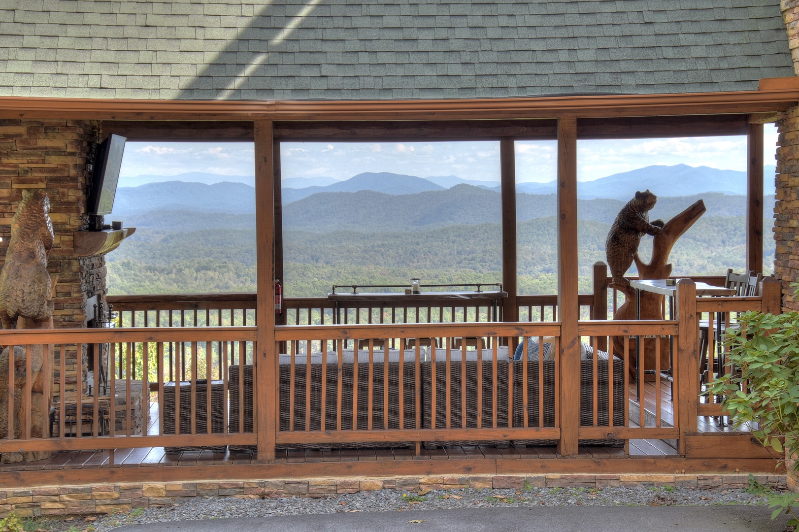 Grand Bluff Retreat- Entry level outdoor living area with mountain views