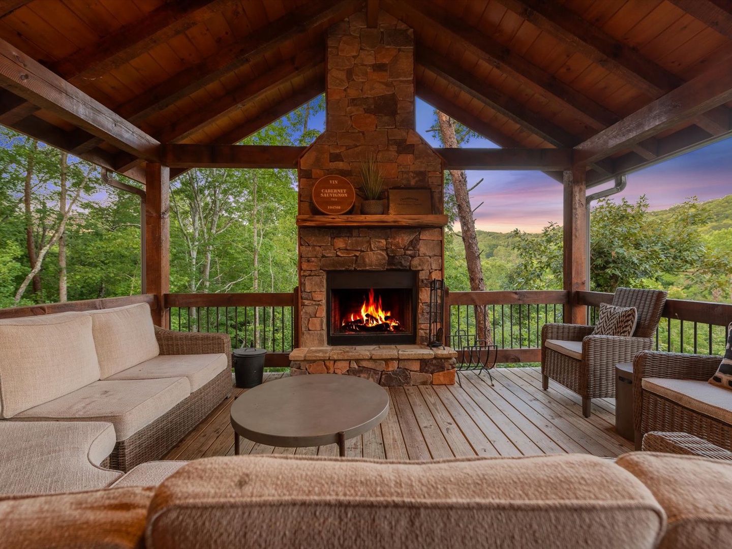 Whisky Creek Retreat- Entry deck fireplace with outdoor seating