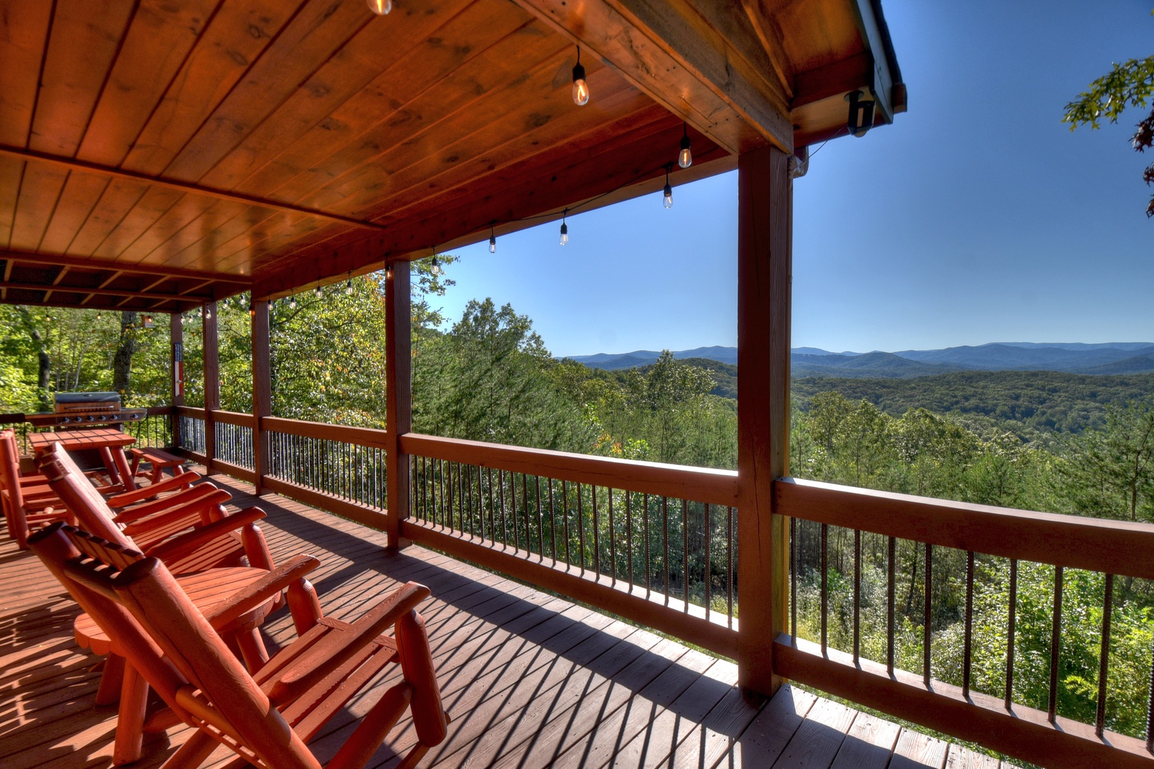Sunrock Mountain Hideaway- Deck area with outdoor seating and mountain views