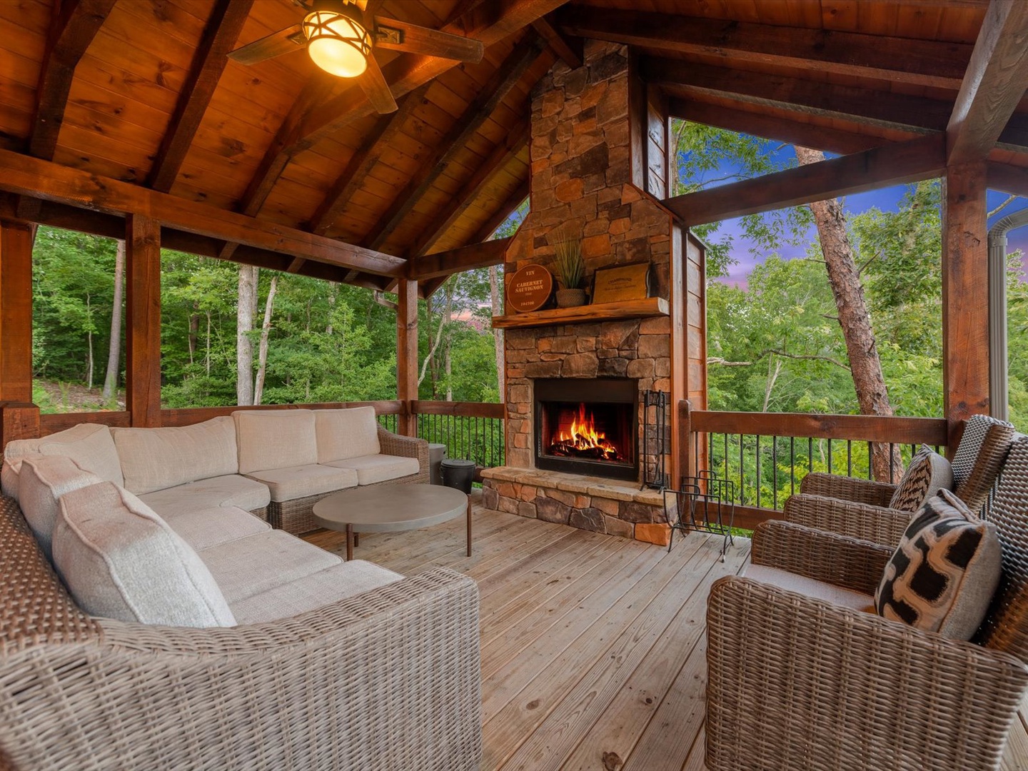 Whisky Creek Retreat- Entry deck fireplace with lounge furniture