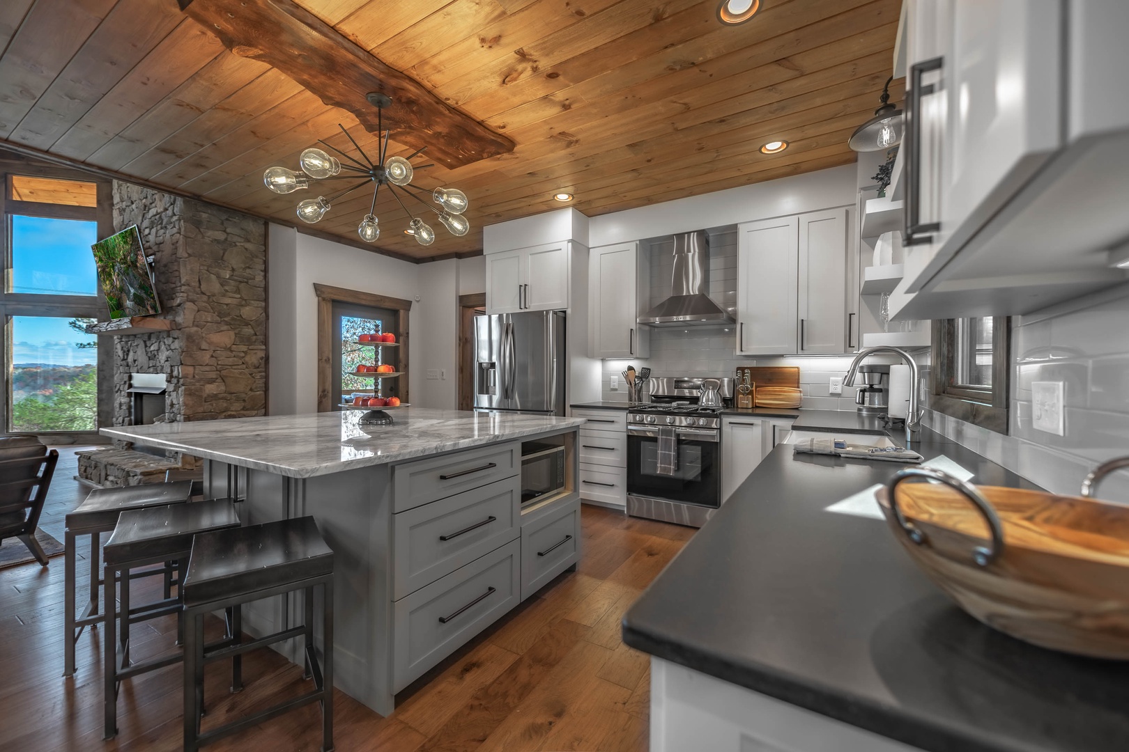 The Ridgeline Retreat- Fully equipped kitchen area with a modern design