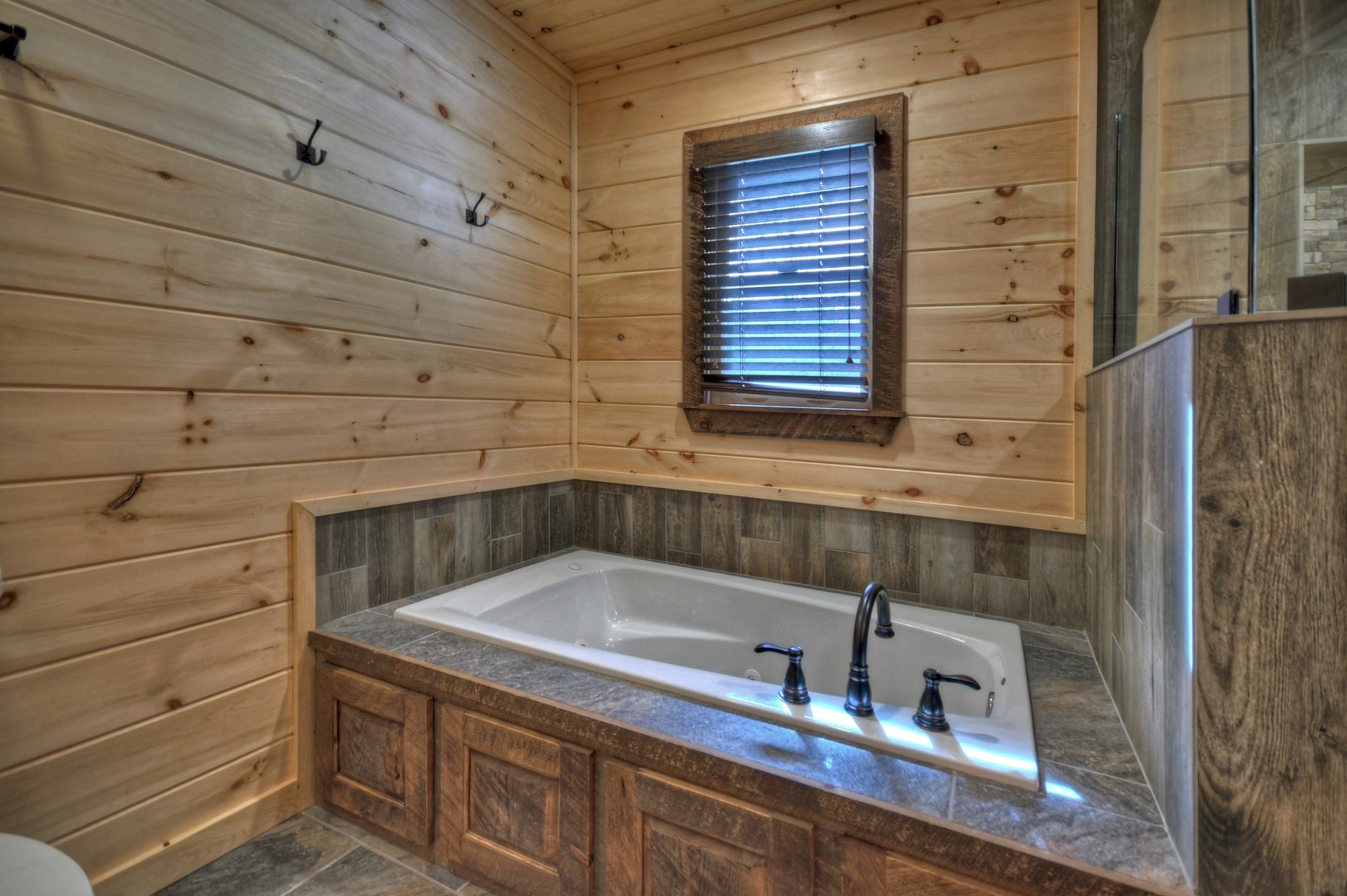 Whisky Creek Retreat- Main level soaker tub in the full bathroom