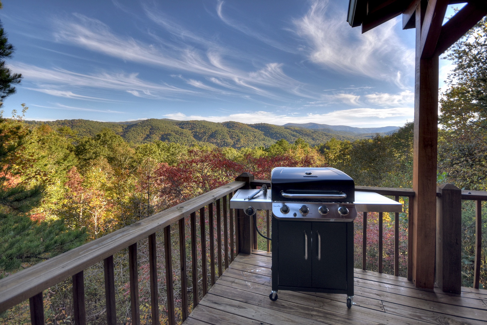 The Good Place- Deck area with a grill and long range mountain views