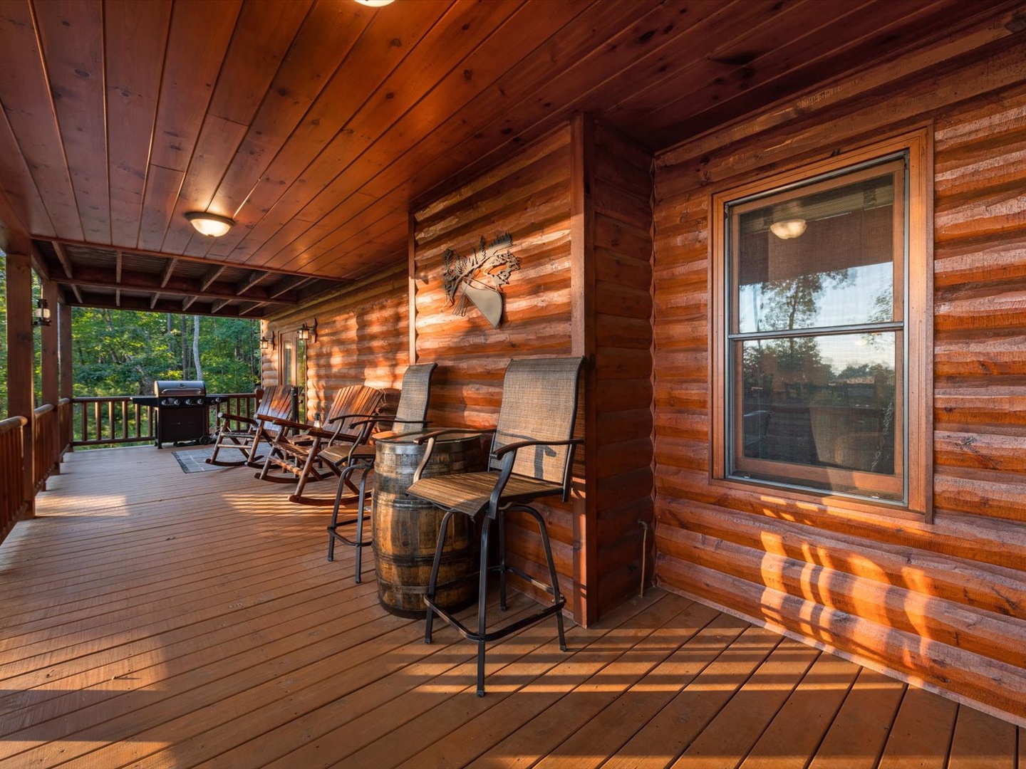 Soaring Hawk Lodge - Entry Level Deck Outdoor Fireplace Area