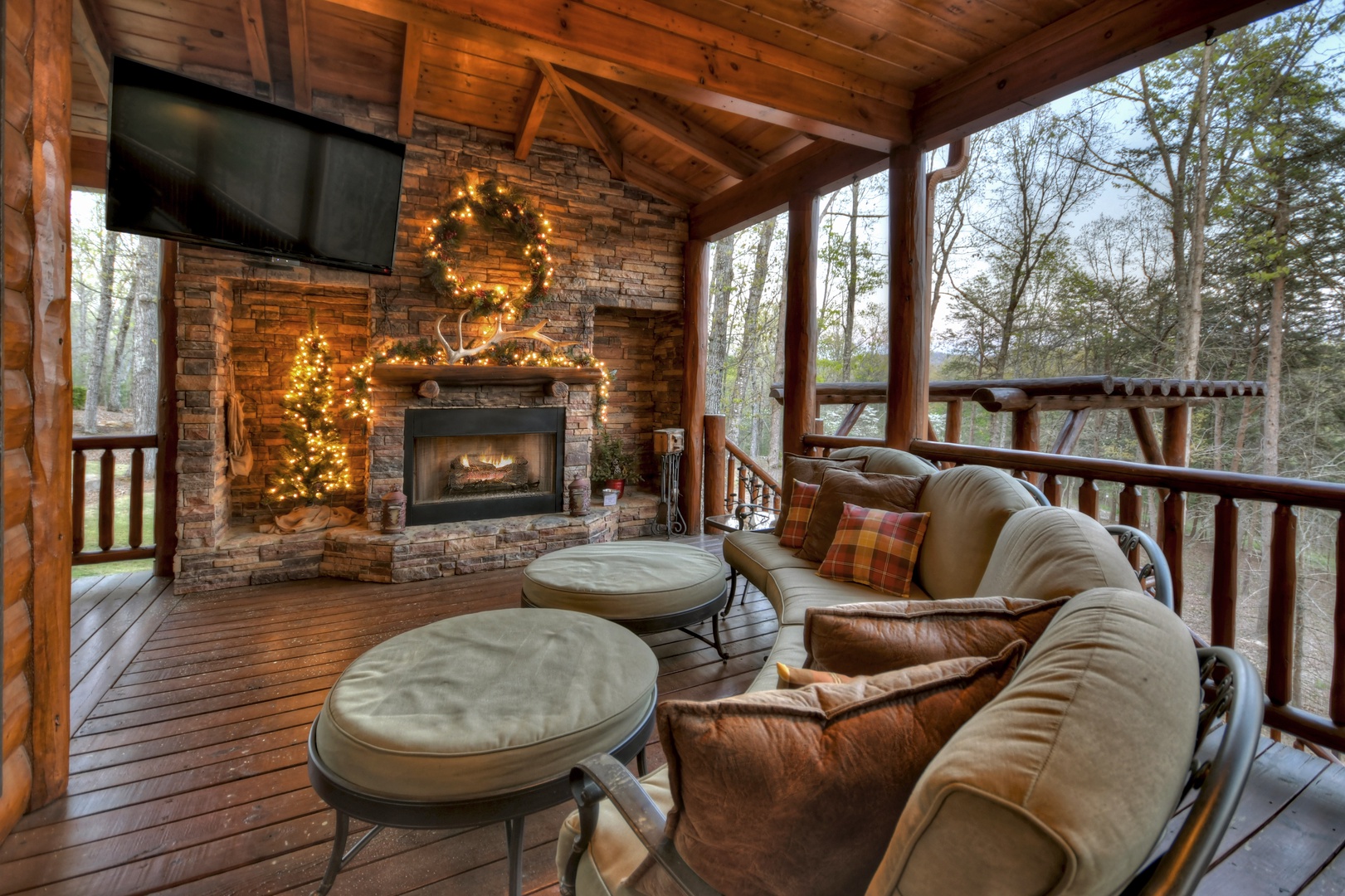 Sassafras Lodge- Patio seating with a TV and fireplace