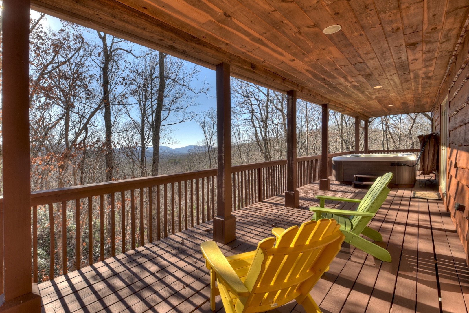 Family Farmhouse- Outdoor deck seating with mountain views