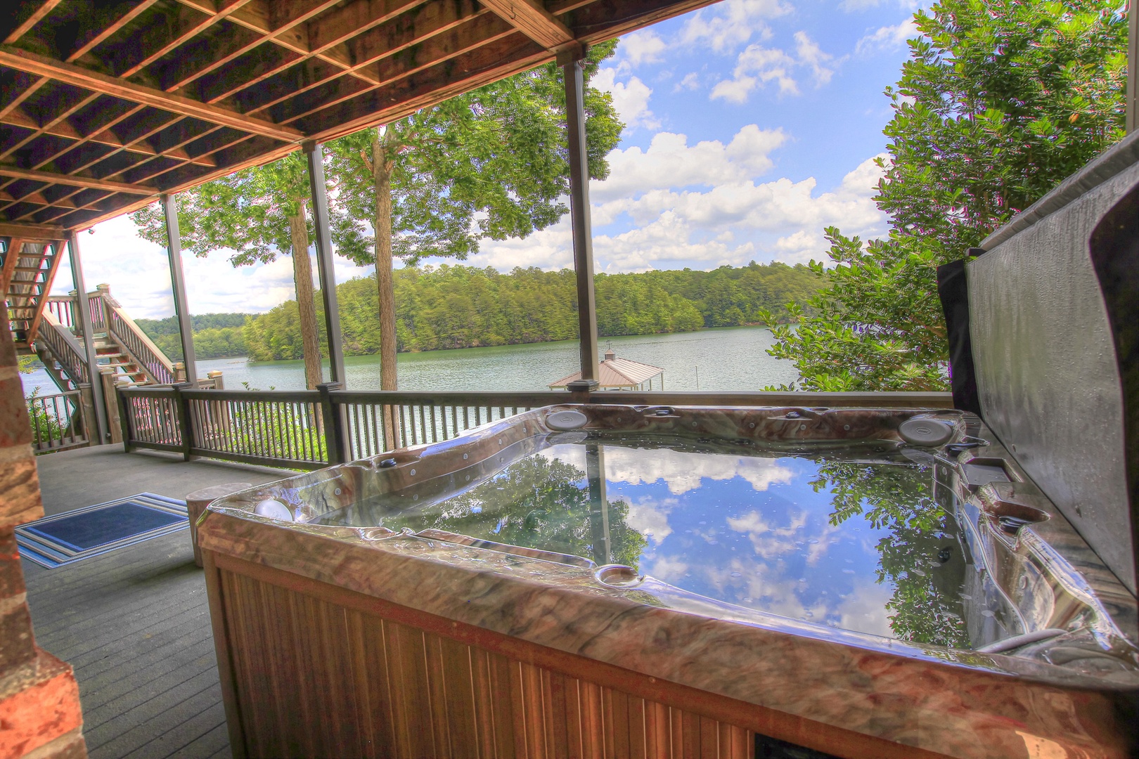 Blue Ridge Lakeside Chateau- Lower level deck with hot tub