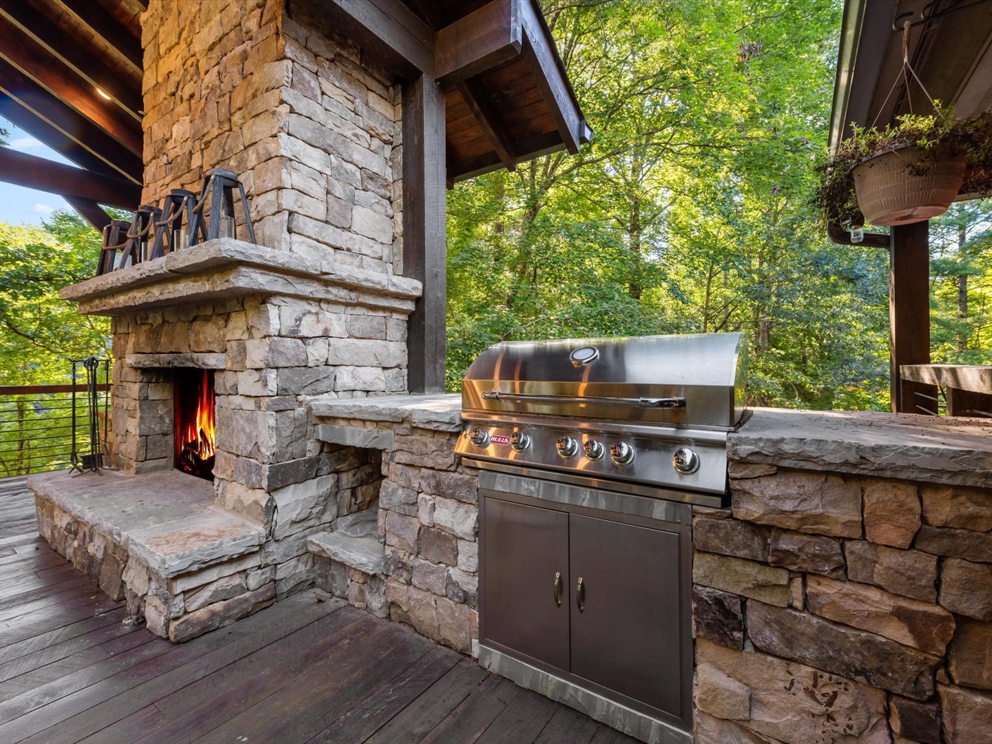 River Joy Lodge- Entry Level Deck Fireplace and Grill