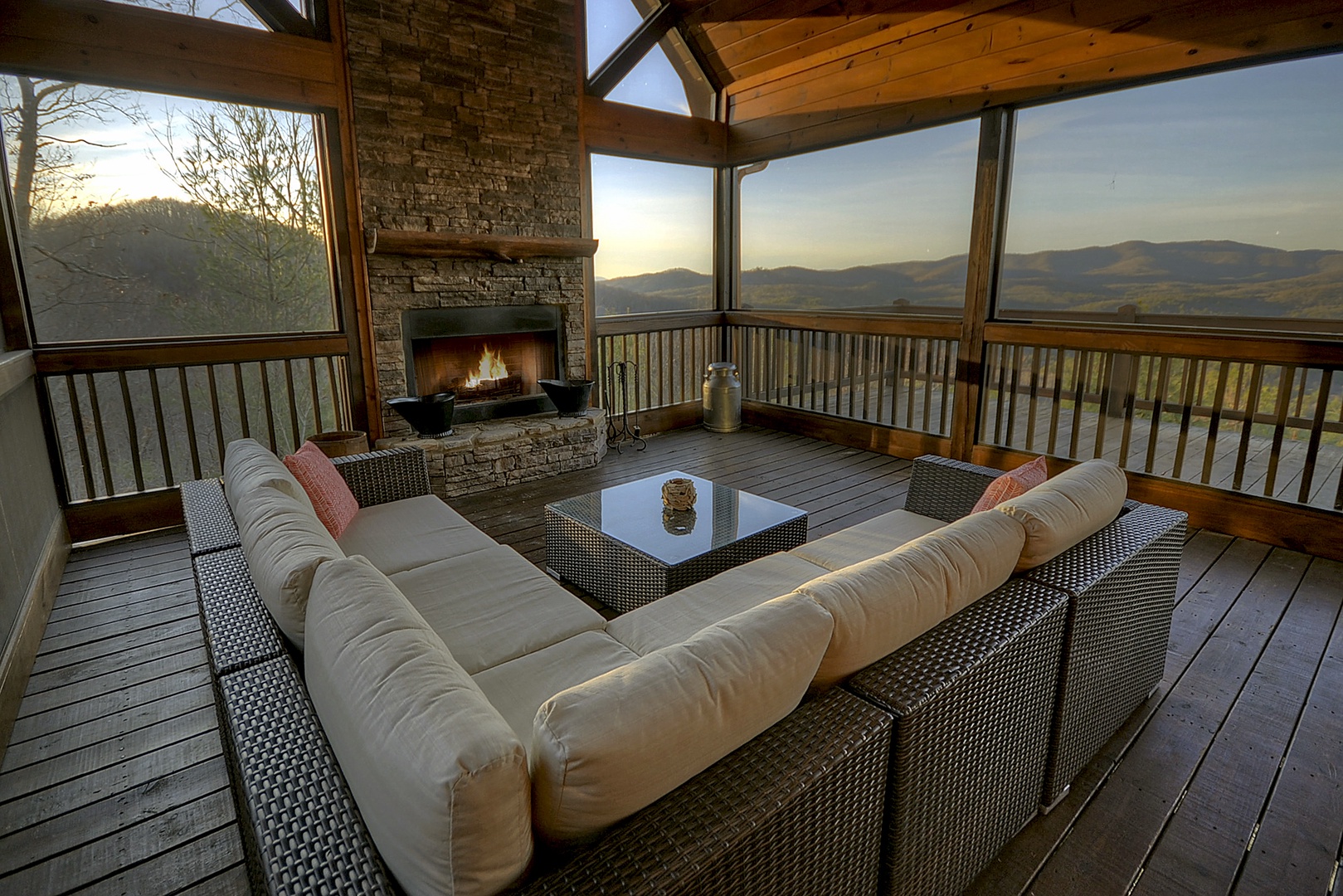 Bearcat Lodge - Screened in porch with outdoor seating and fireplace