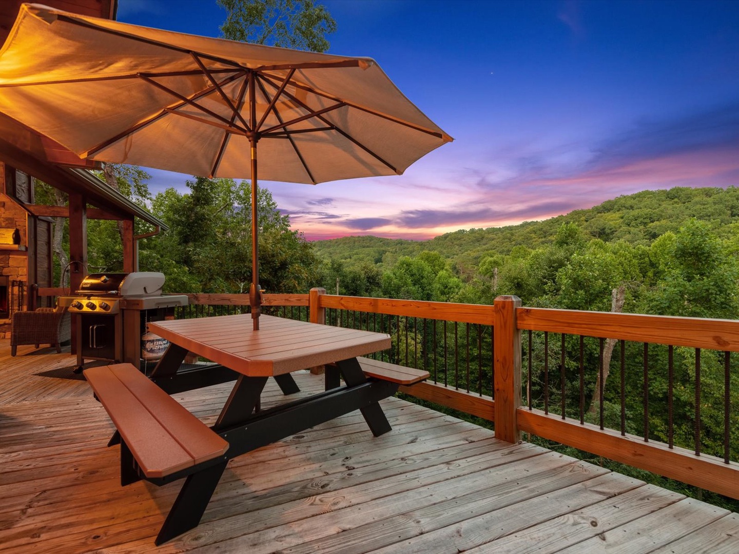 Whisky Creek Retreat- Entry deck with outdoor picnic table and mountain views