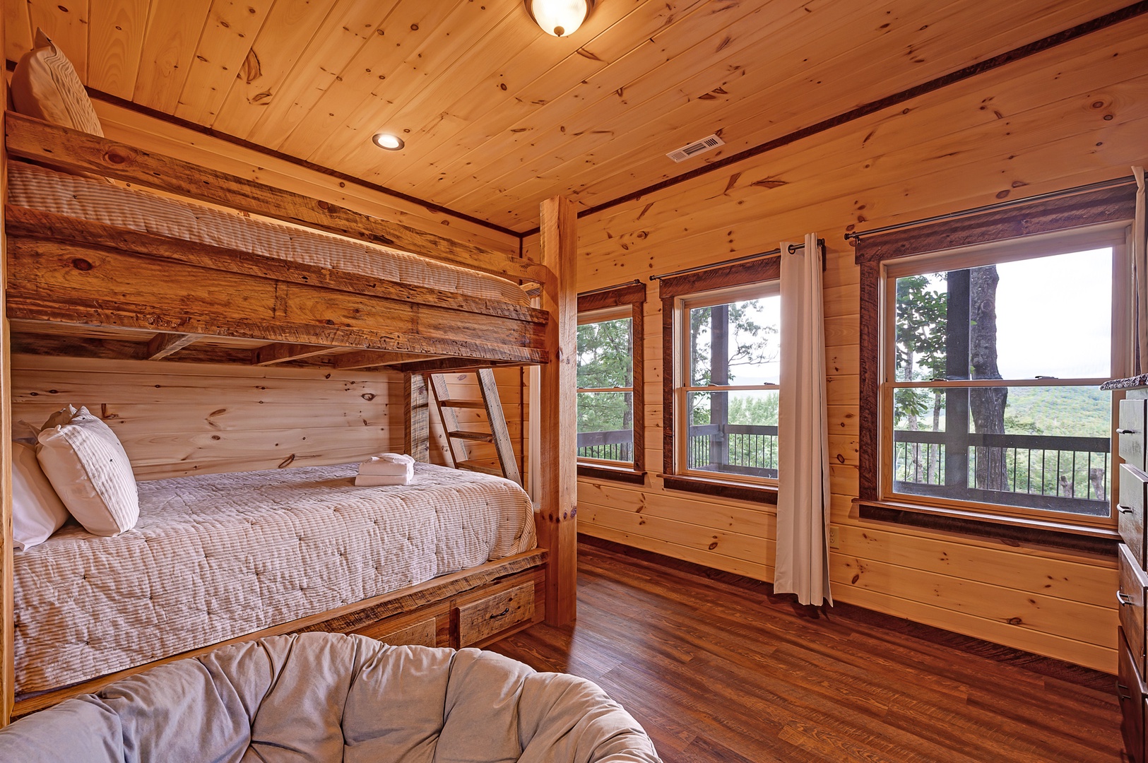 Feather & Fawn Lodge- Lower level bunk room with mountain views