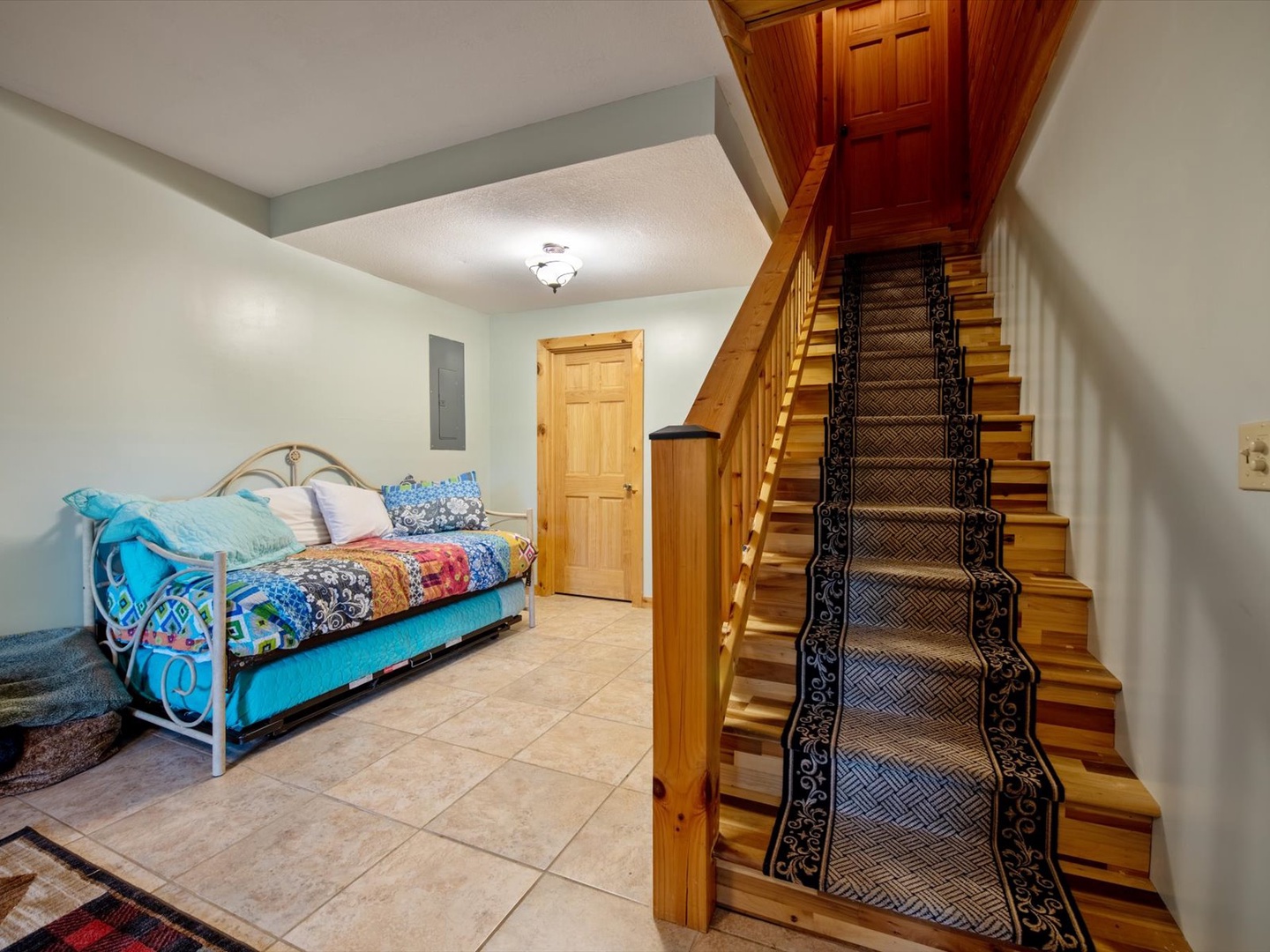 License 2 Chill - Lower Level Living Room Staircase