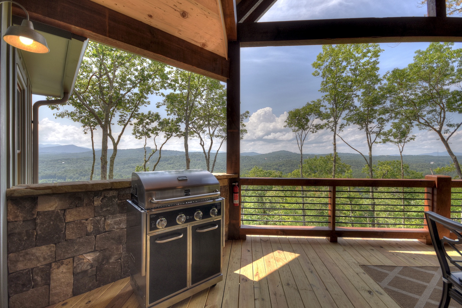 New Heights- Main level outdoor grill area with mountain views