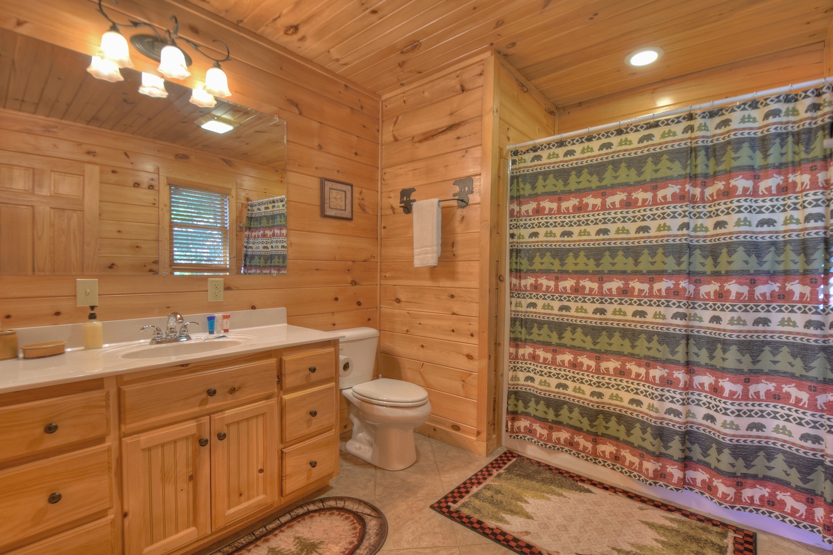 Sunrock Mountain Hideaway- Full bath with step up shower on the middle level