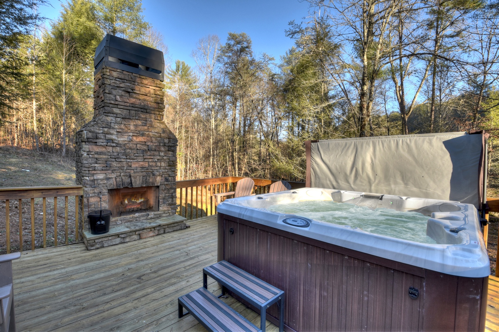 Hibernation Station- Hot tub with an outdoor fireplace