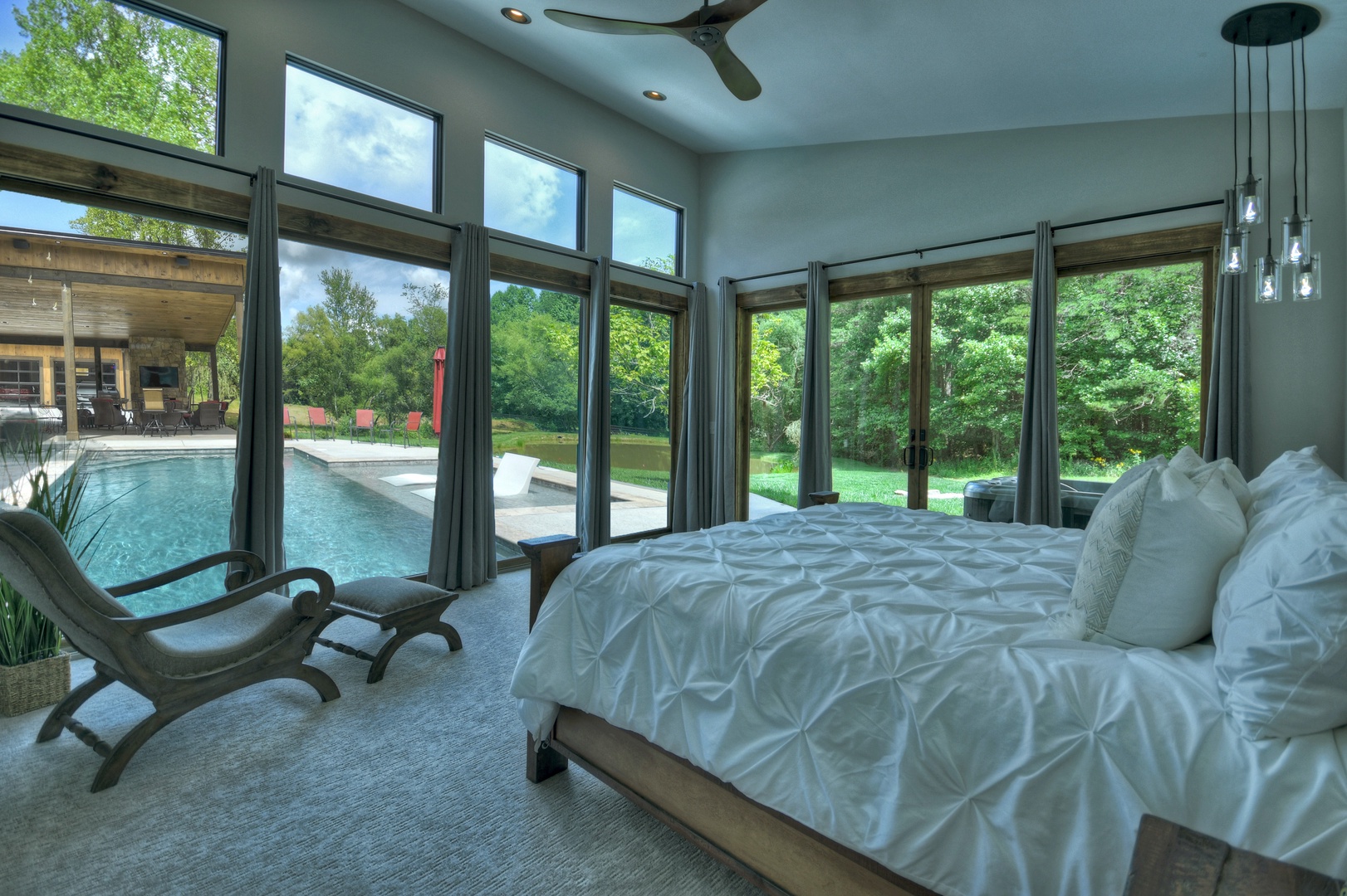 Cohutta Mountain Retreat- Master king bedroom with view of the pool