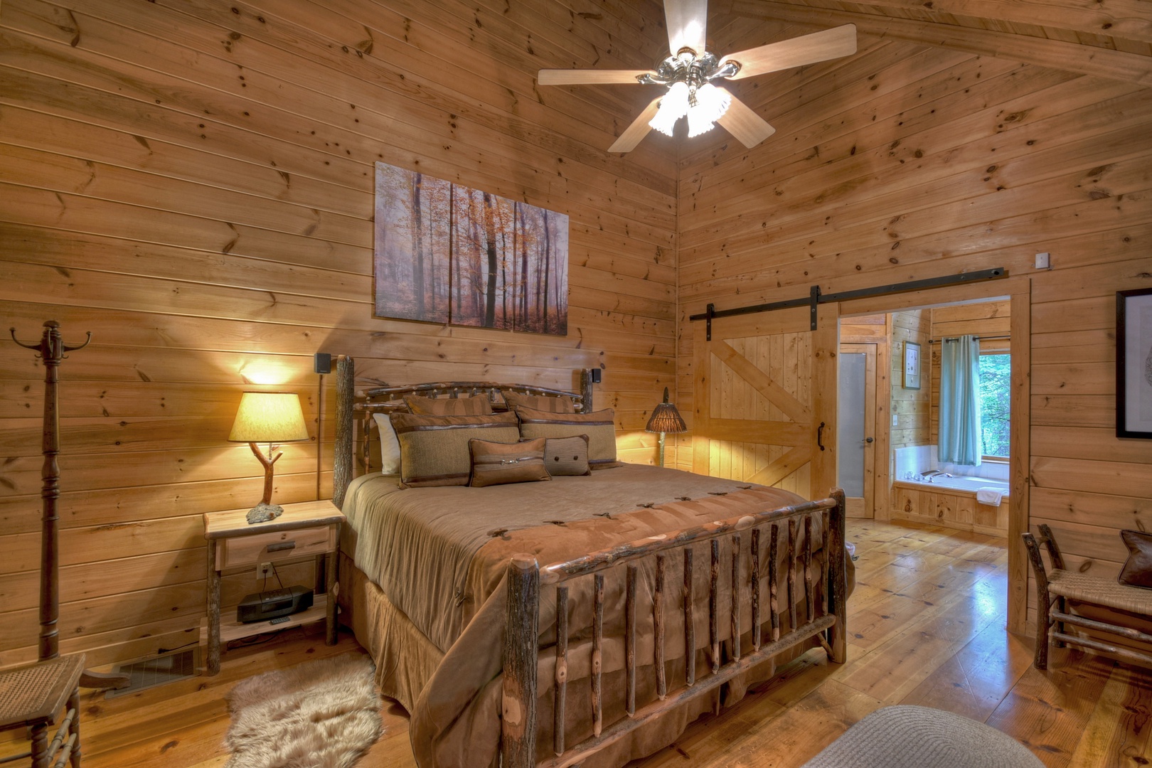 Falling Leaf- Master bedroom with rustic furnishings and master bathroom access