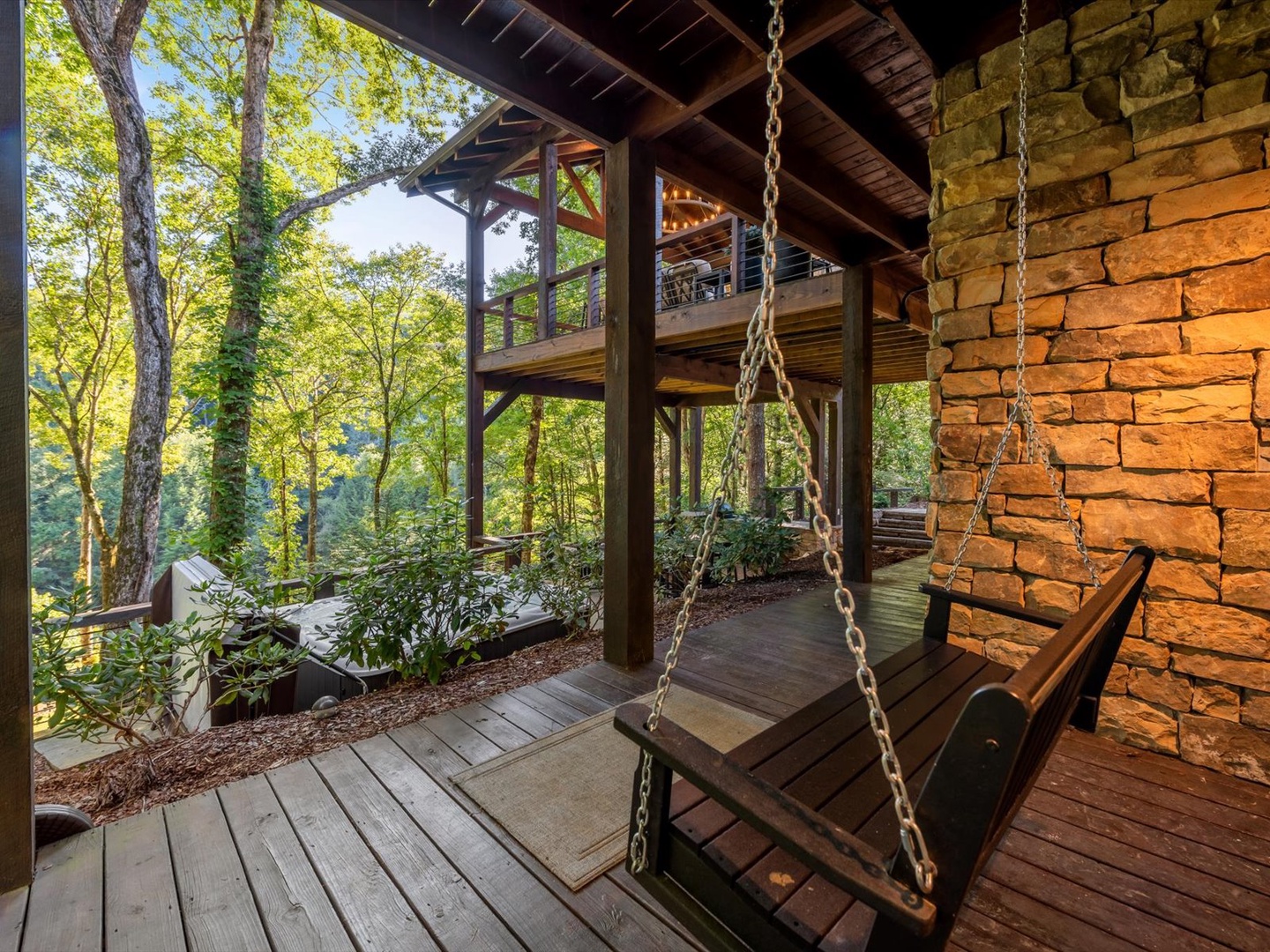River Joy Lodge- Lower Level Porch Swing View