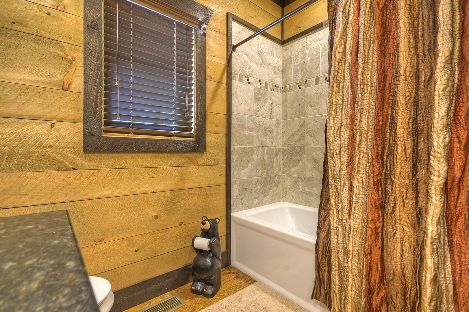 Vista Rustica- Entry level bathroom with shower tub combo
