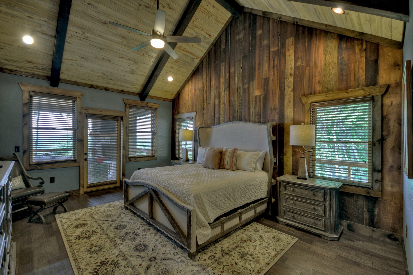 New Heights- Main level king master bedroom with rustic furnishings