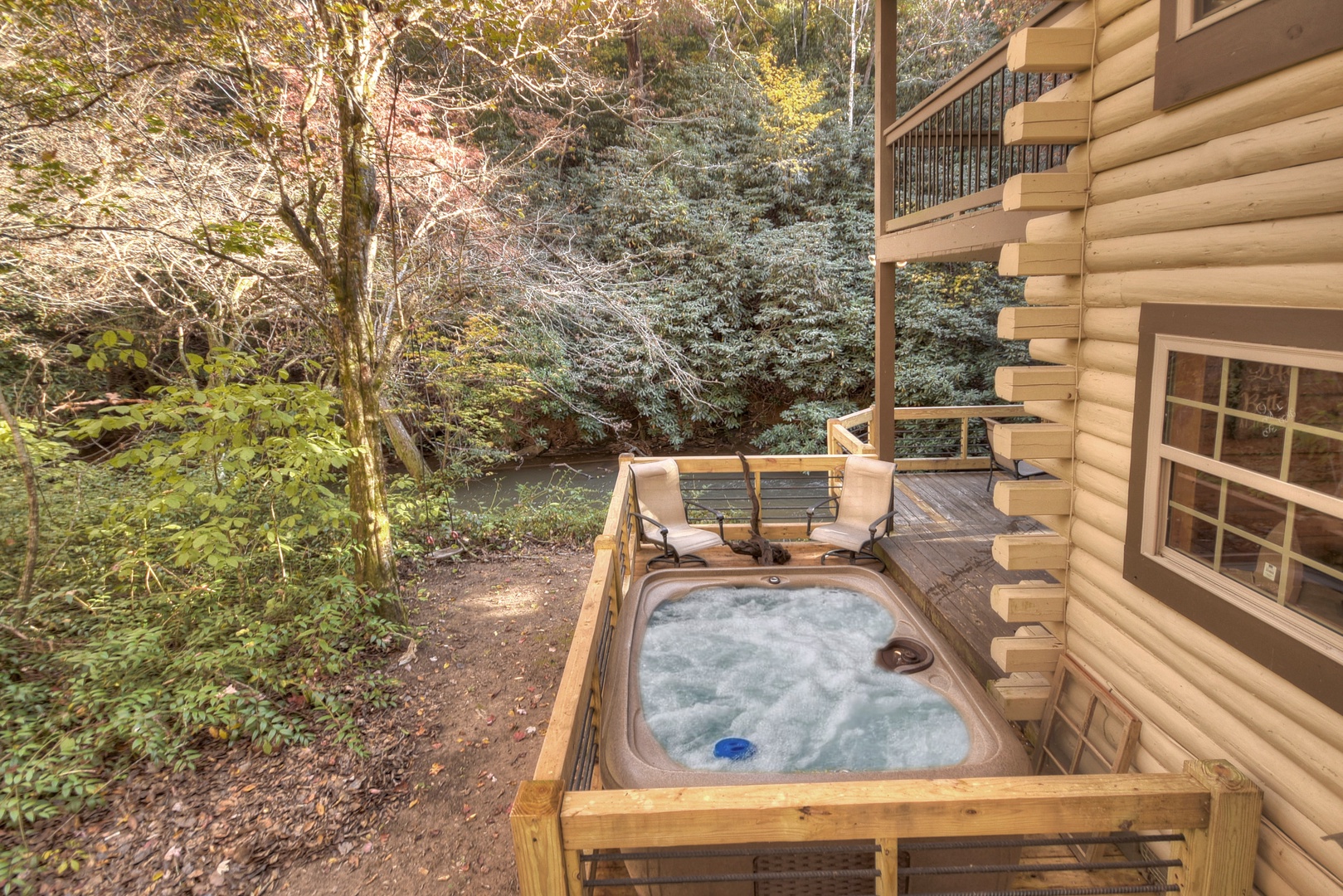Happy Trout Hideaway- Full hot tub view with deck seating