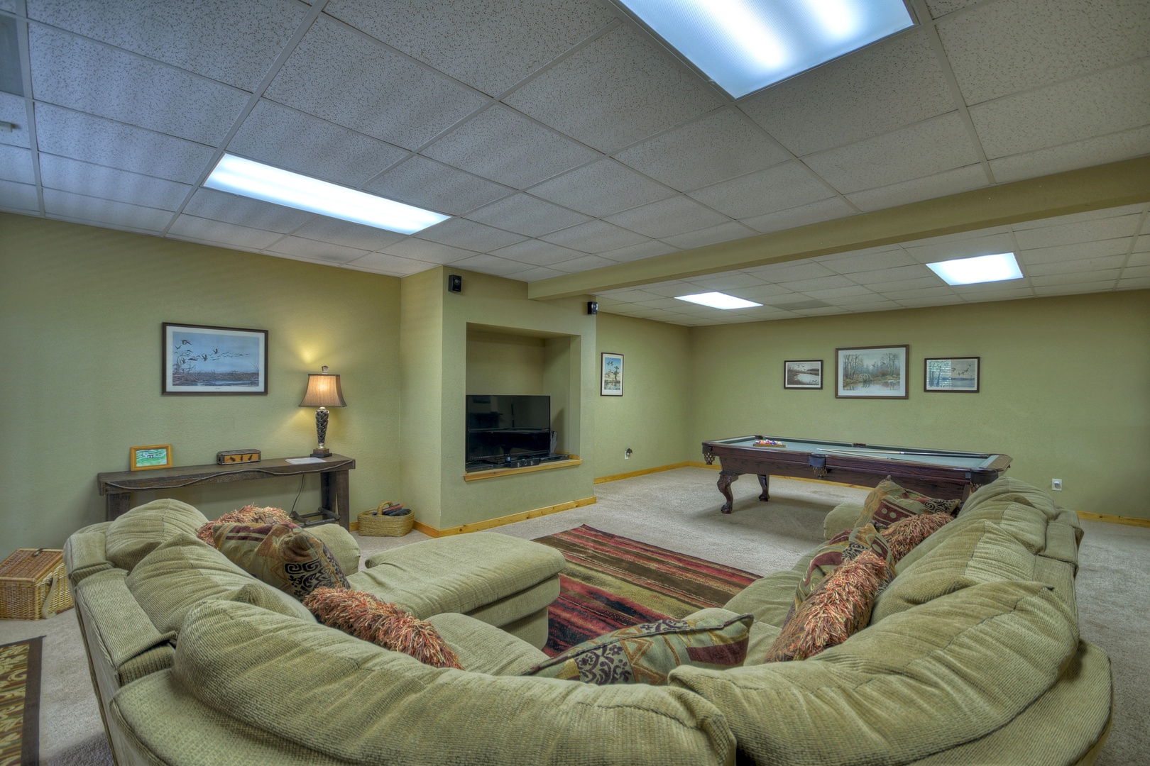 Above Ravens Ridge- Lower level den area with a pool table